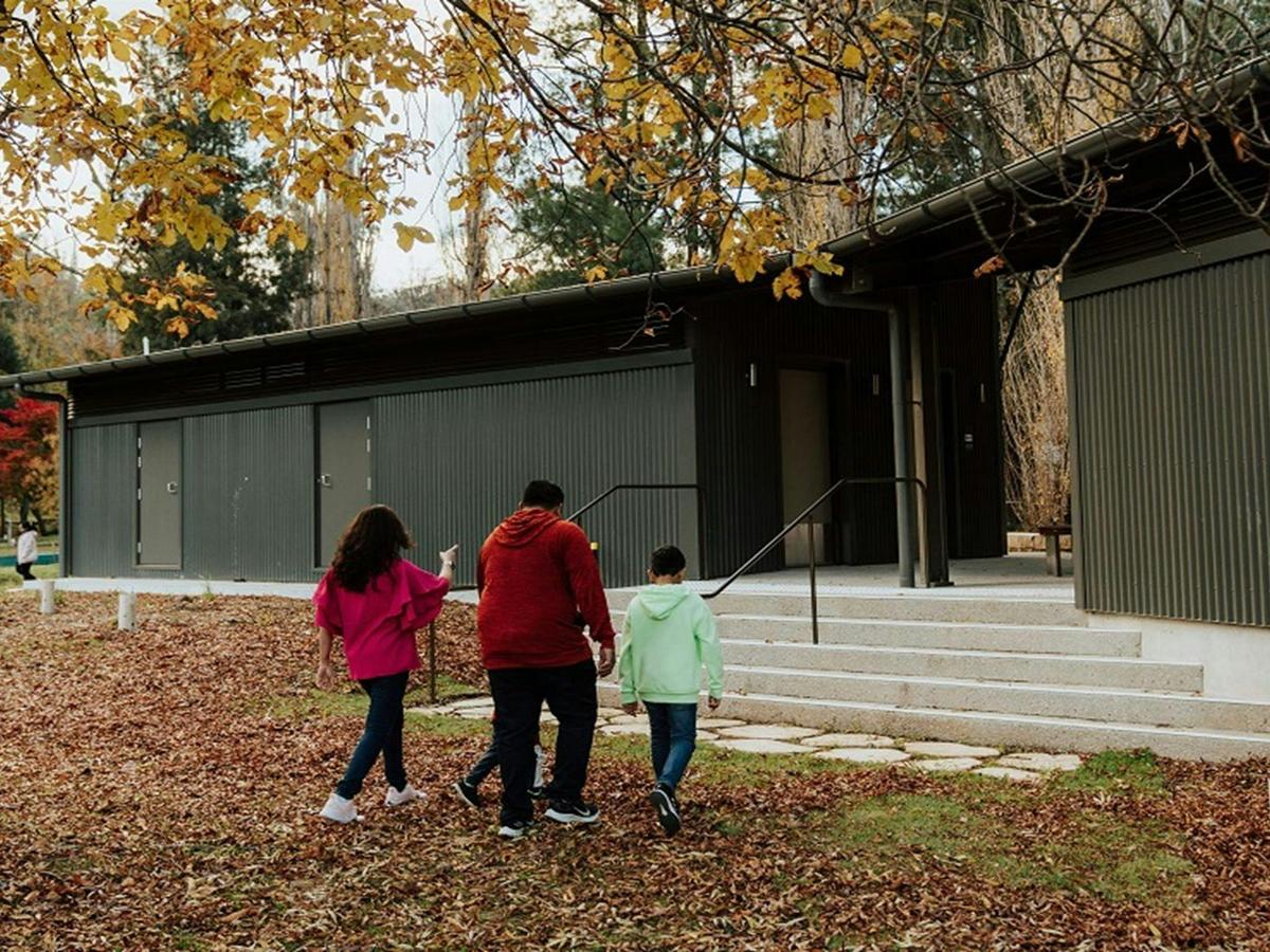 Campers outside the amenities block in Wombeyan Caves campground. Credit: Remy Brand/DPE &copy; Remy