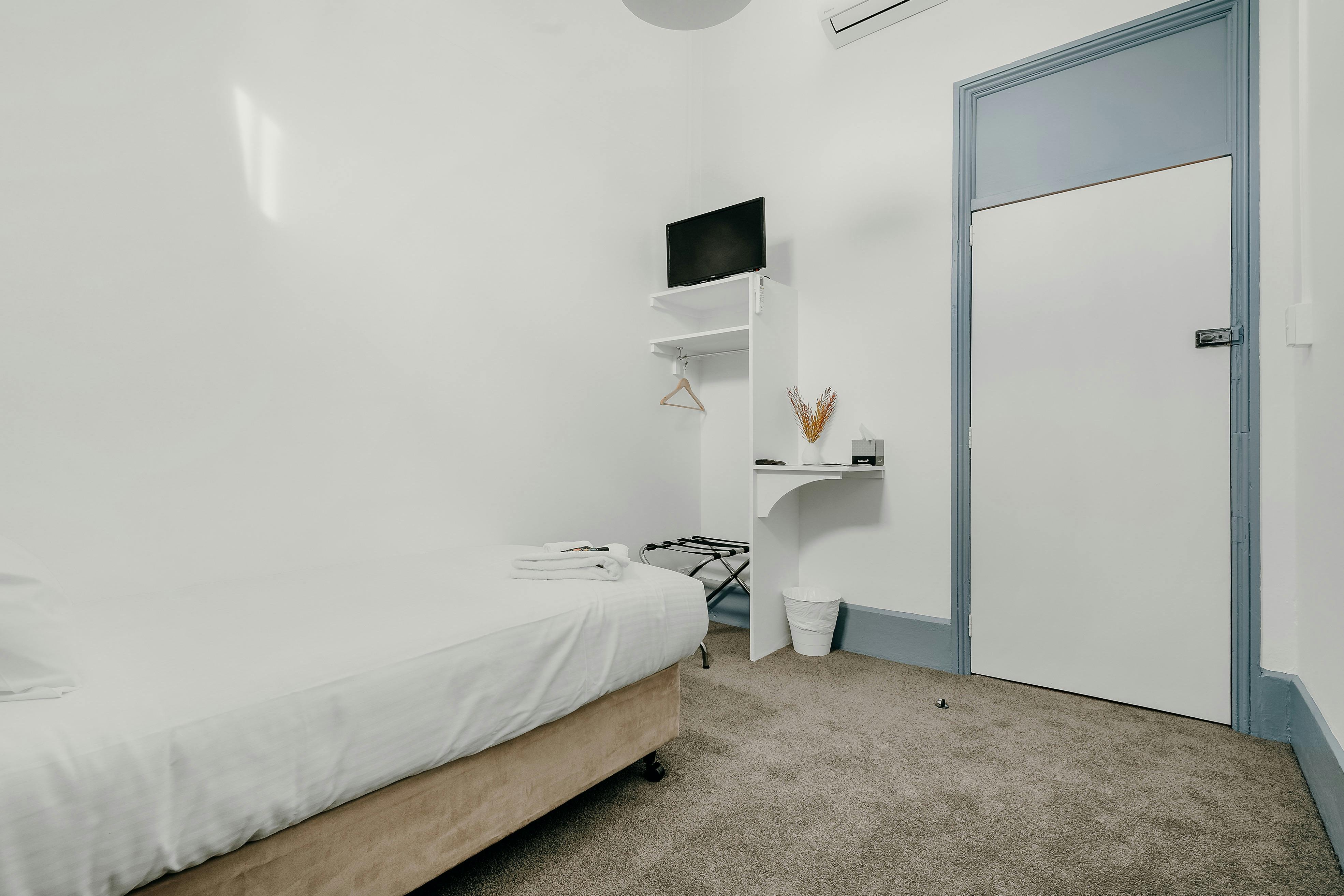 Single Room + Shared Bathroom