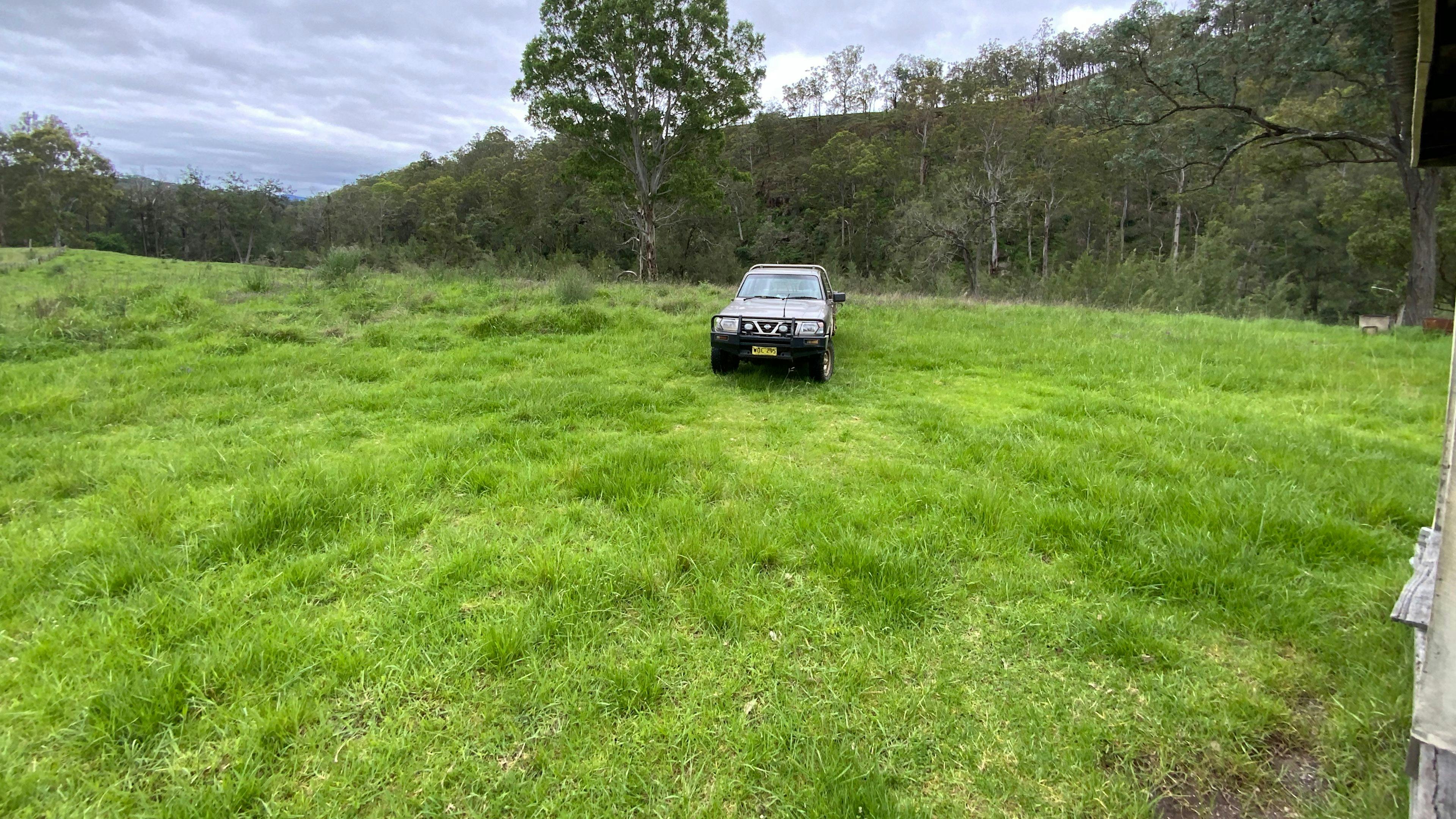 Looking northeast.  The river is over the bank behind the ute.