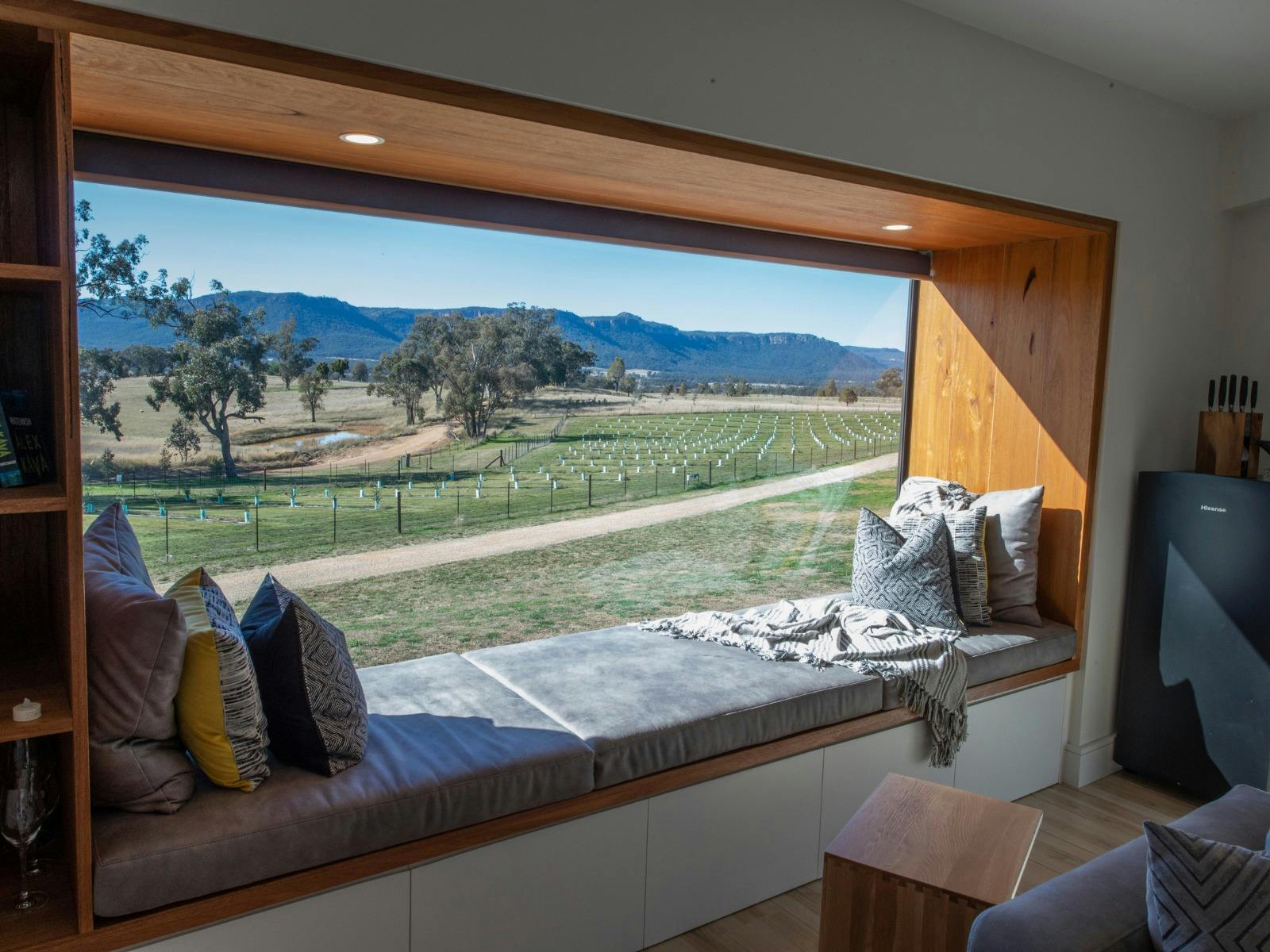 Relax in the comfortable window seat over the truffiere and watch the world go by