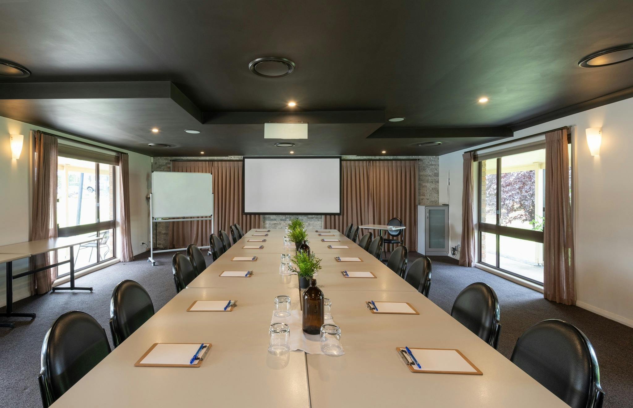 Elevate Your Meetings in Our Conference Room with Plenty of Space and Natural Light!