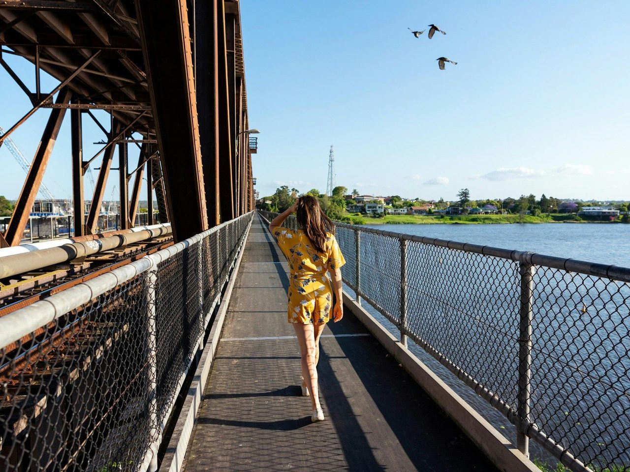 Walking across Grafton bendy Bridge
