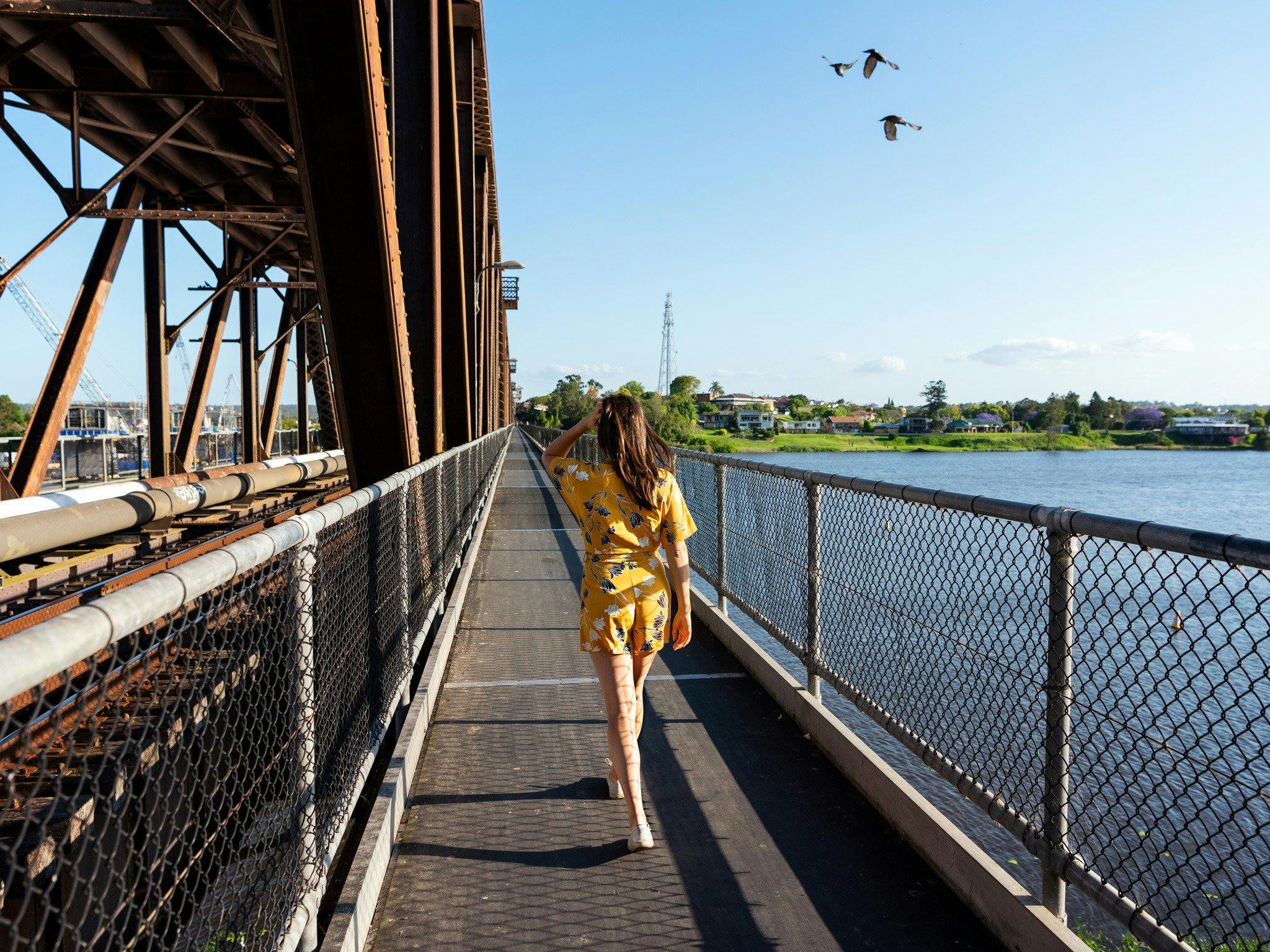 Walking across Grafton bendy Bridge