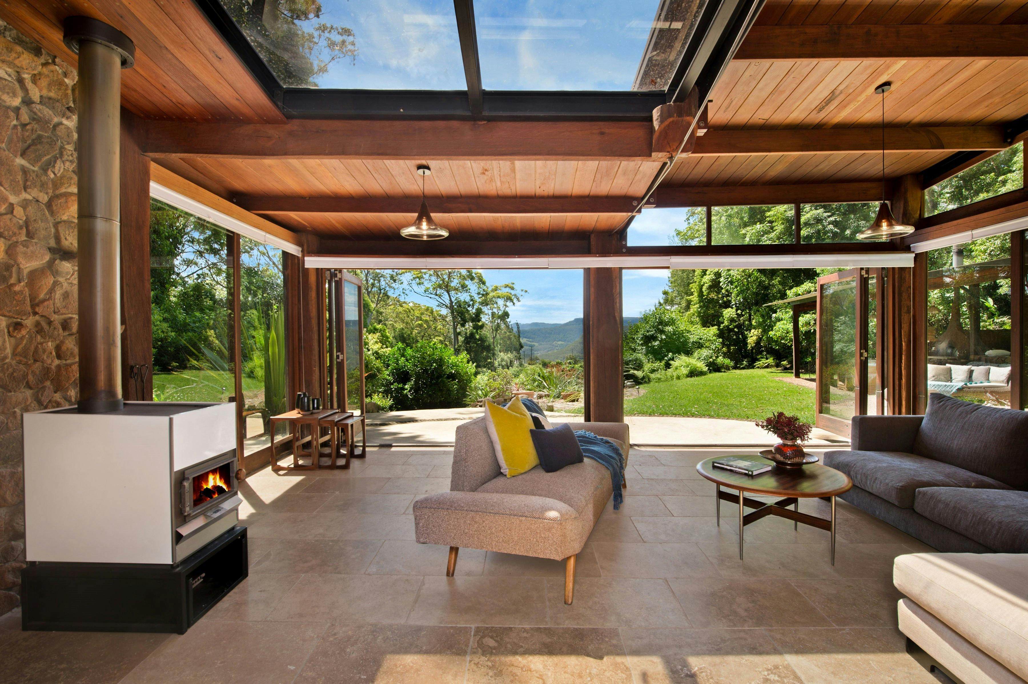 Living Room with combustion fireplace and view