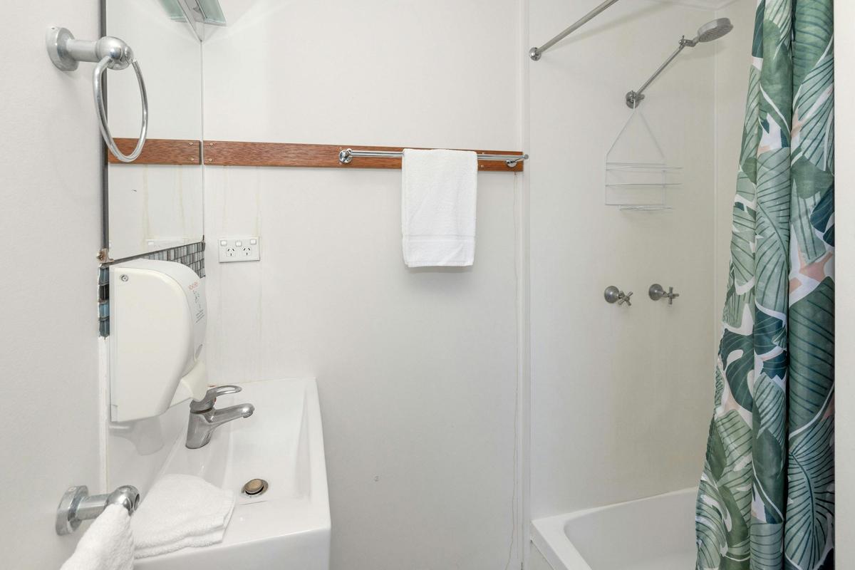 Powered, grassy ensuite site