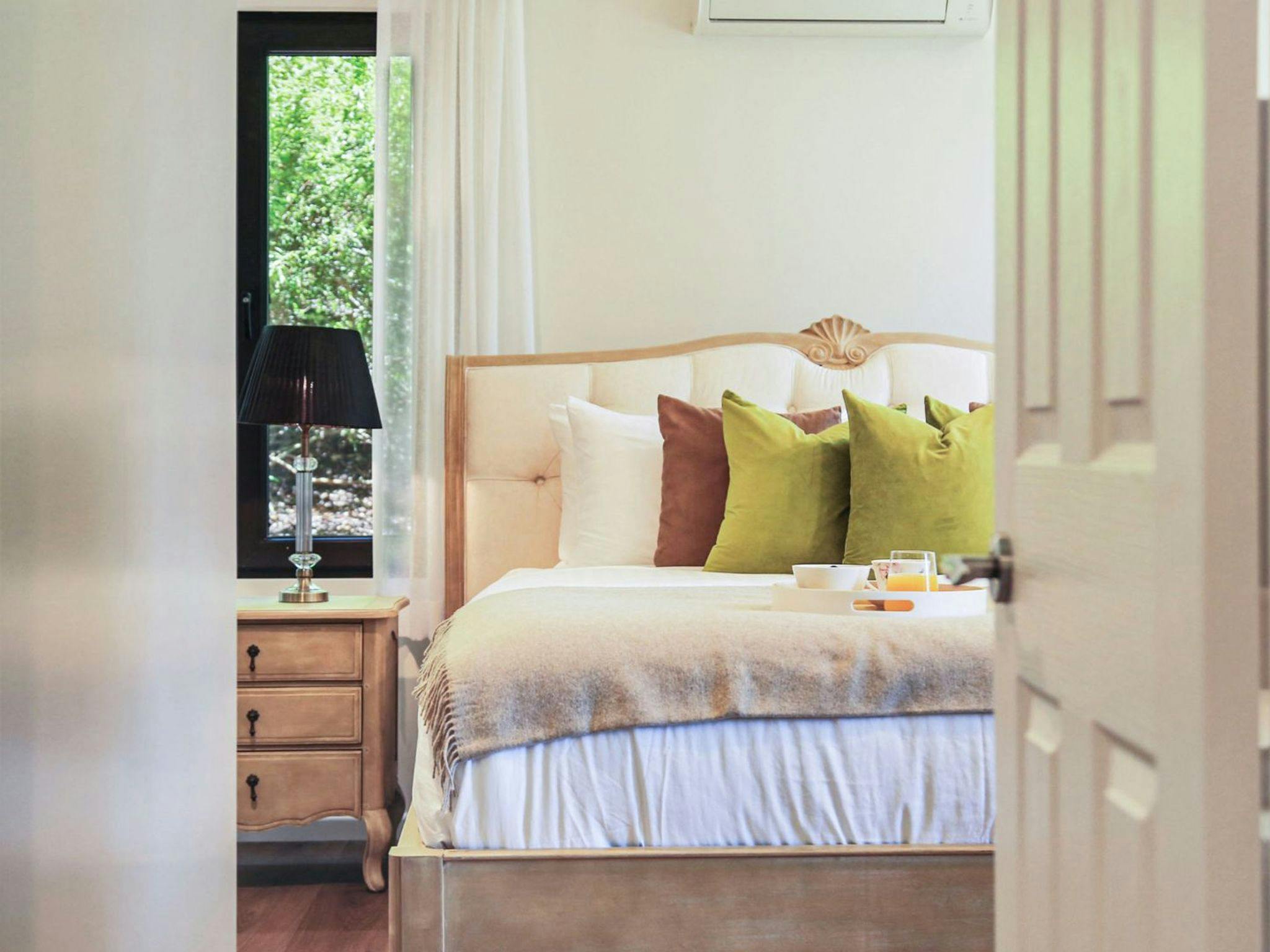 Goolara | Bedroom 1 | King | Ensuite with bath | Standup office desk with monitor | Wi-Fi | Views of