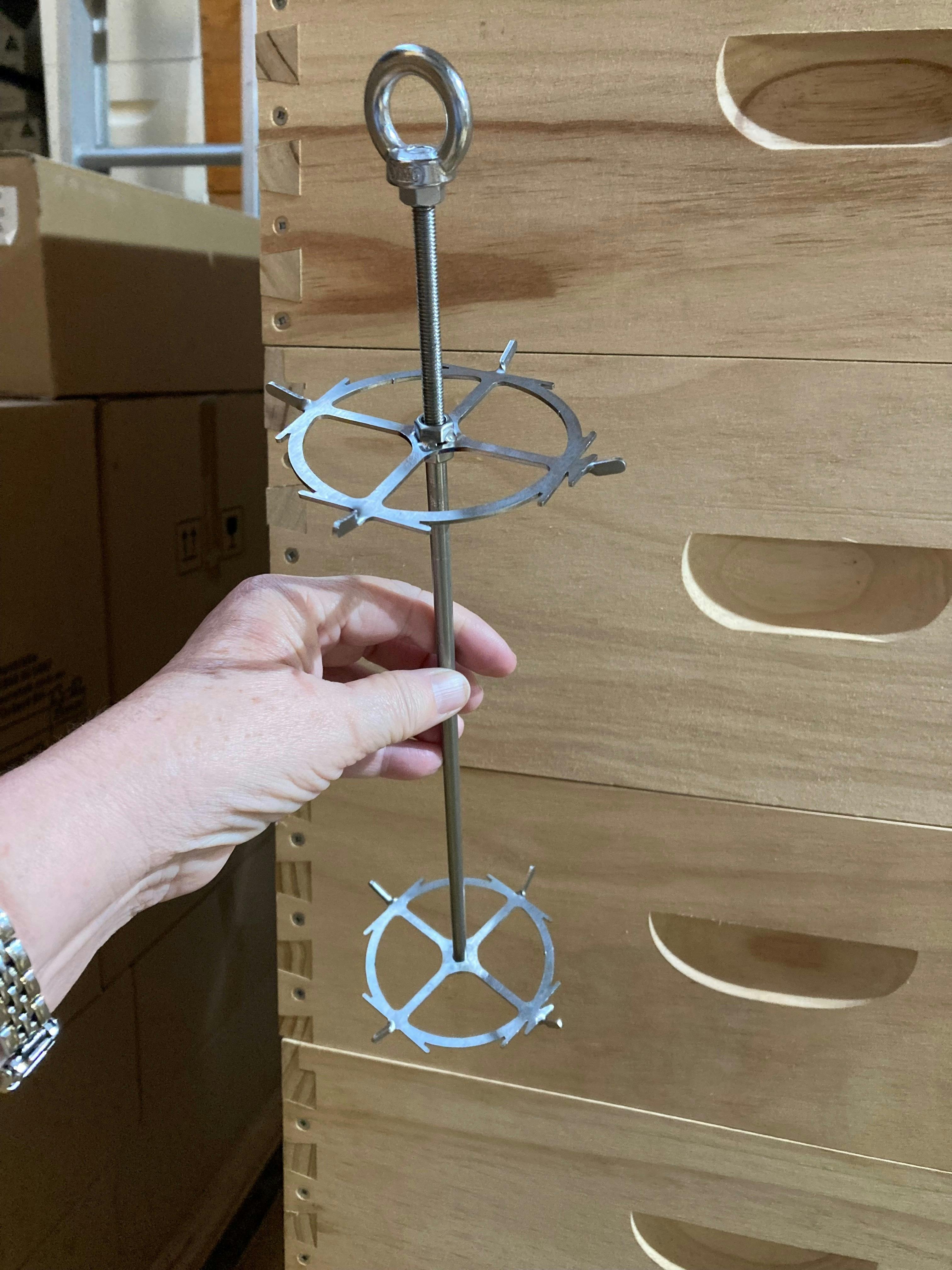 One of the dipping rigs used to make dipped candles in the workshop