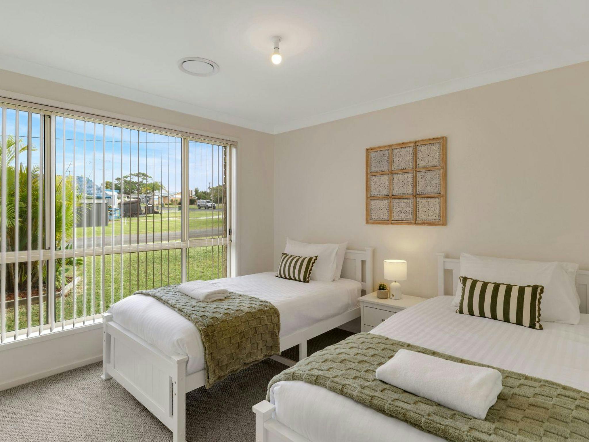 The Coastal Corner | Bedroom 2 | King singles | Air conditioning 