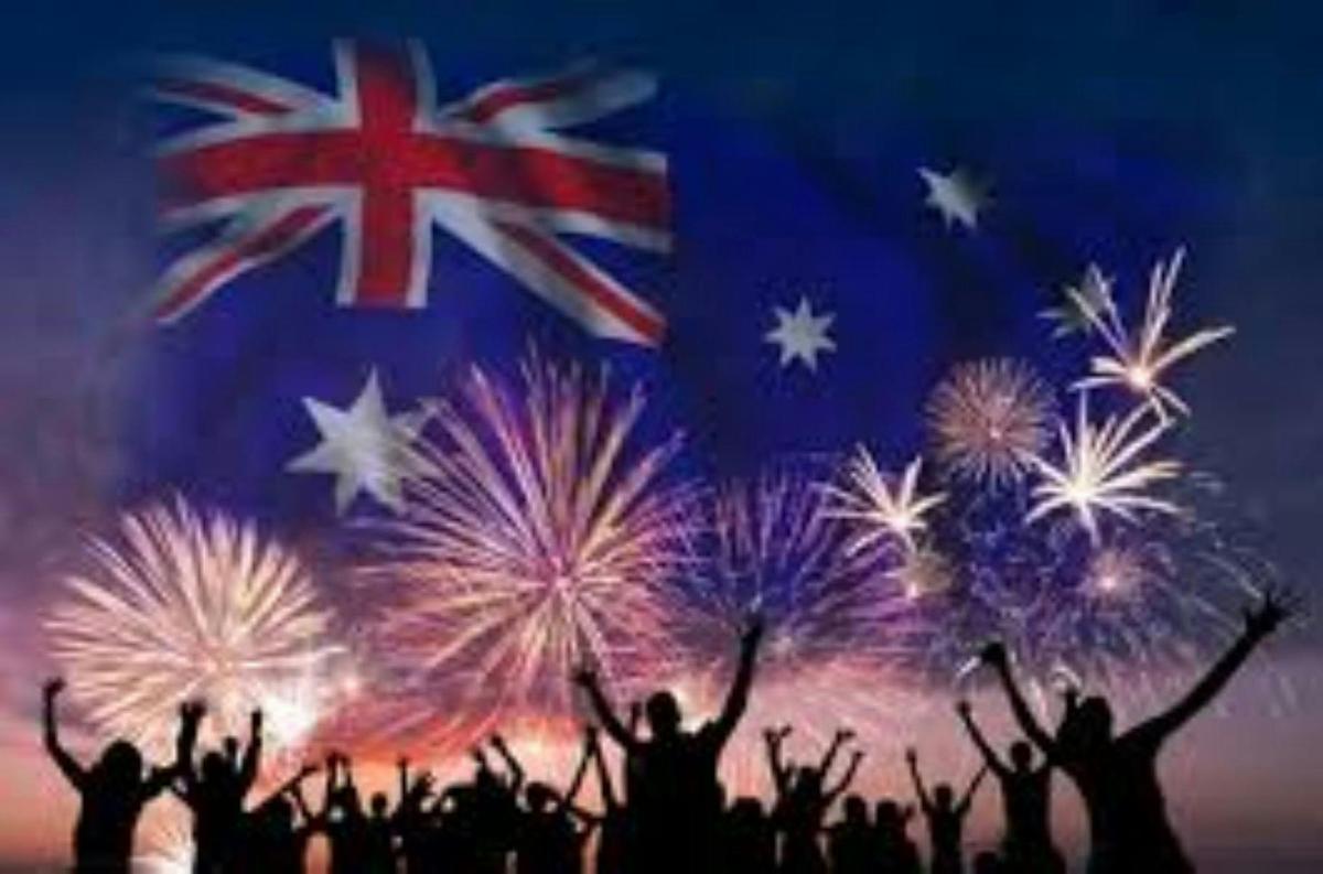 Fireworks with people and AU Flag