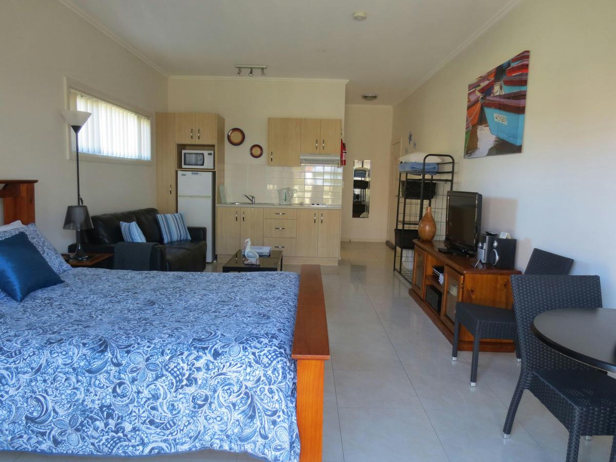 Queen Studio with Fold Out Sofa