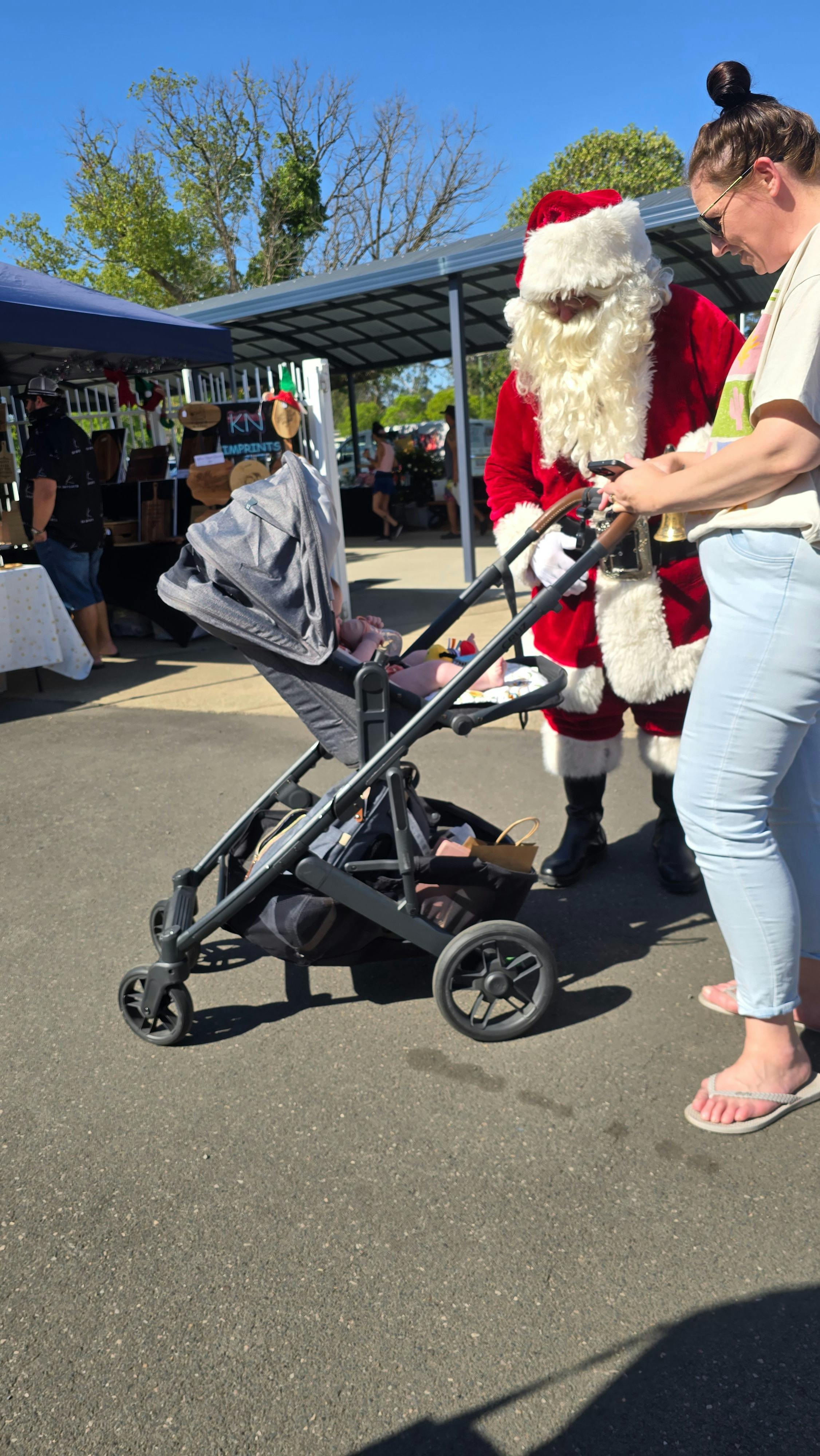 Santa meeting people at the Hawkesbury Country Christmas Market in 2024.