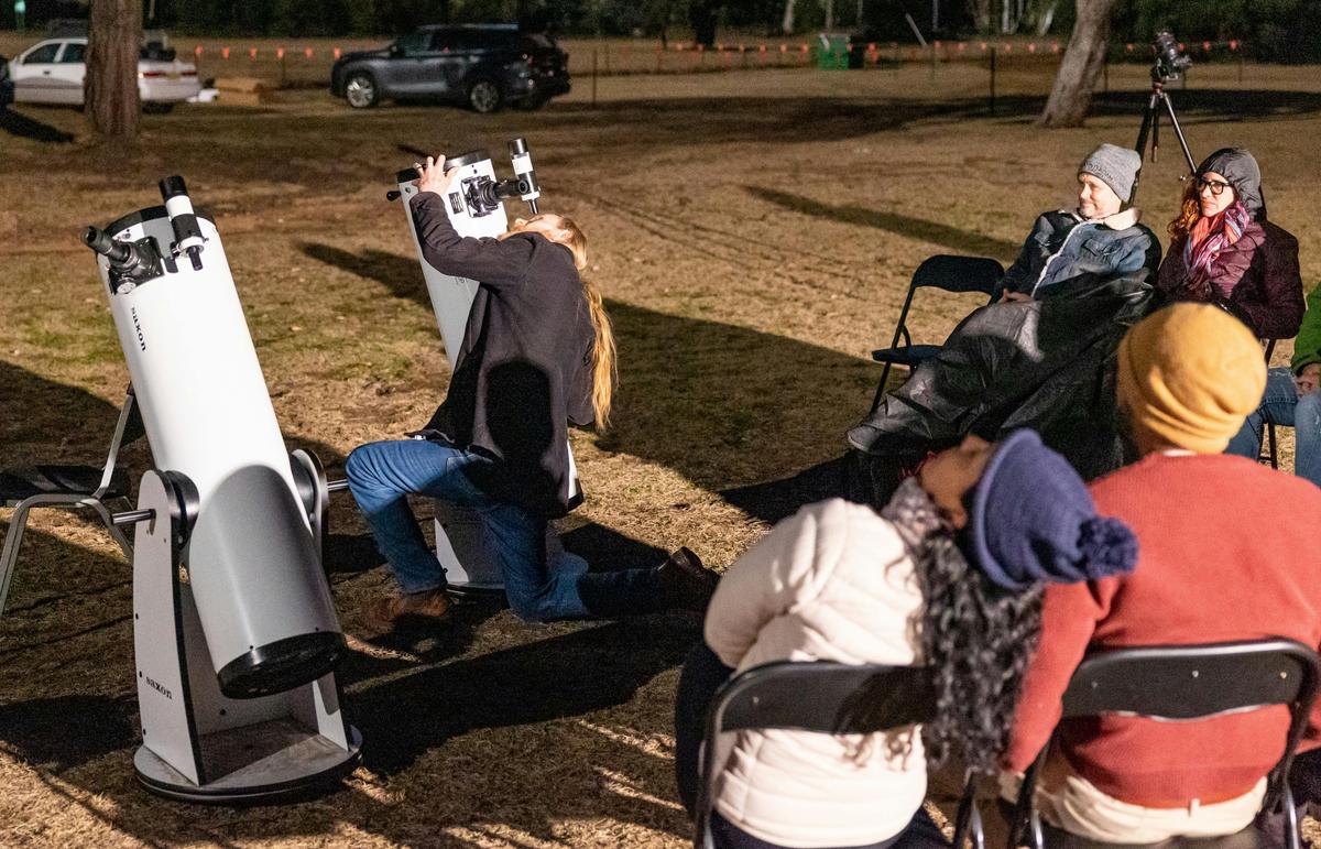 Lining up the telescope on the beautiful universe above.