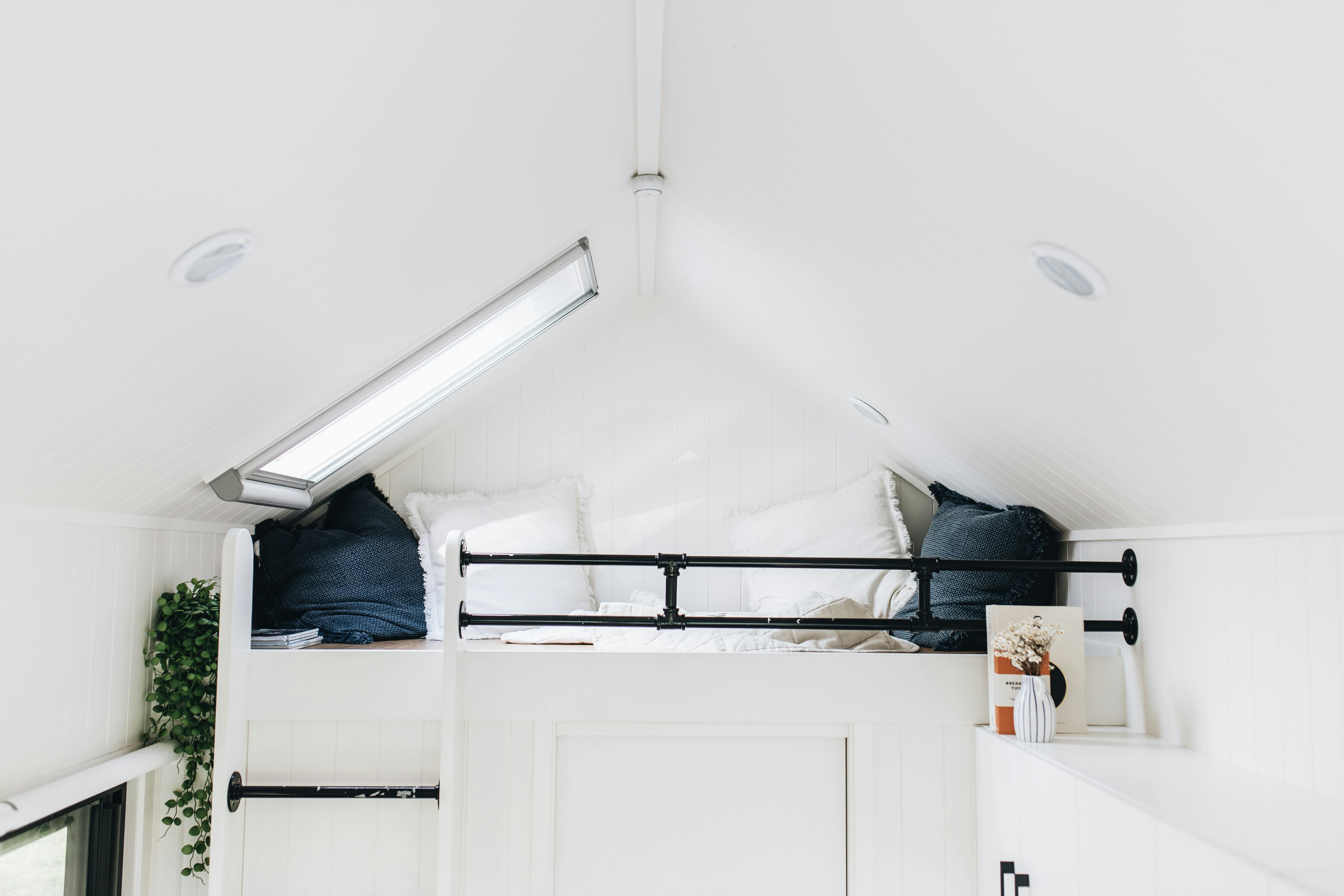 Cosy loft area with skylight that opens out to the canopy of gum trees
