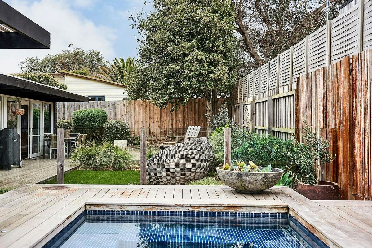 Outdoor area with a pool.