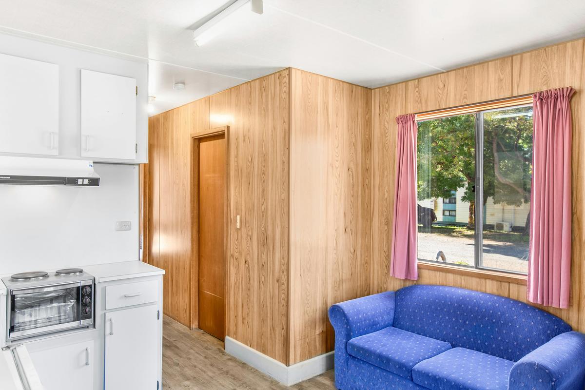 Living area in the two-bedroom family budget cabin