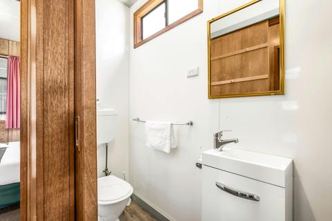 Bathroom in the two-bedroom family budget cabin