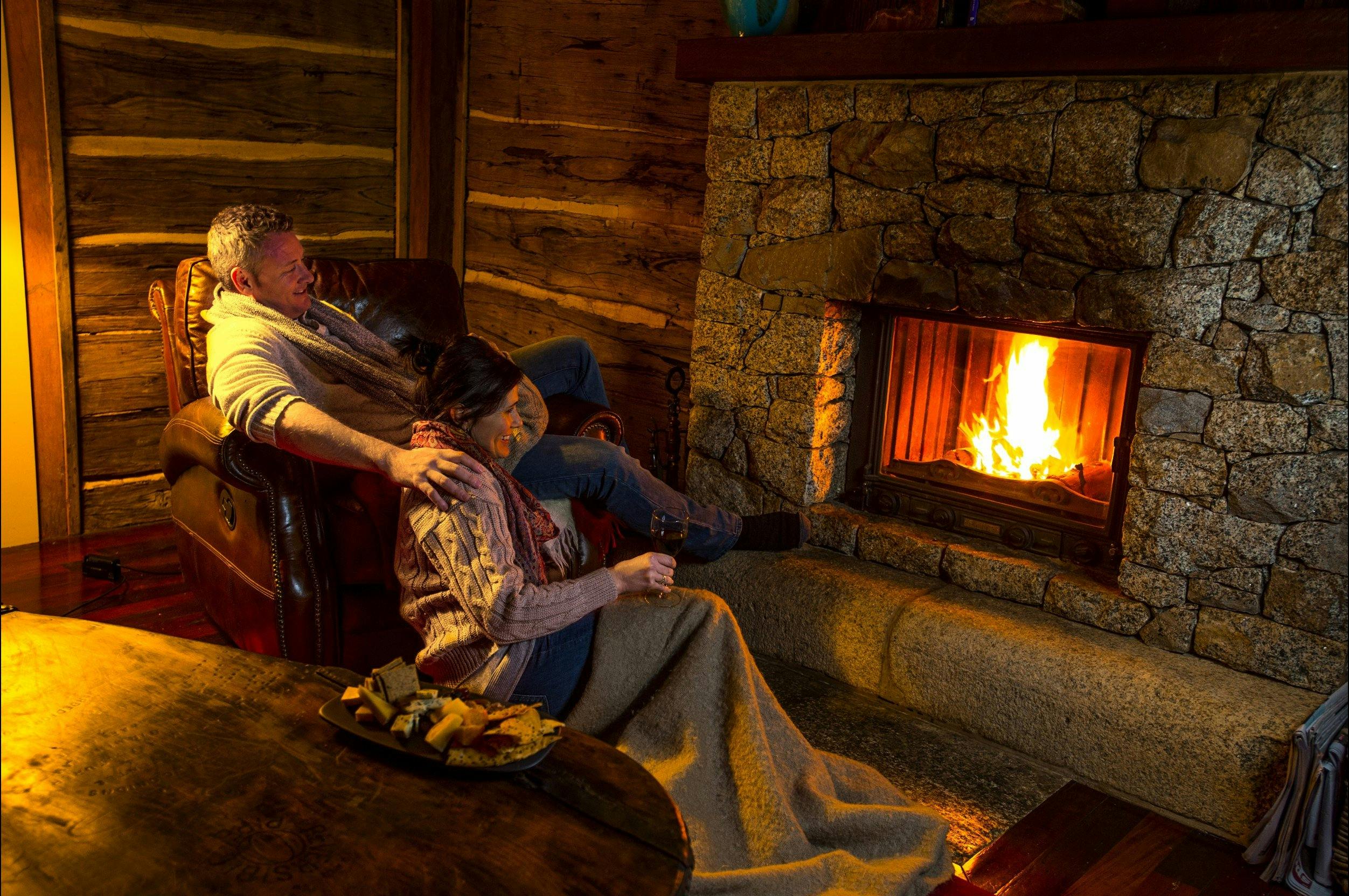 An open fire with wood supplied for the chilly winter months.