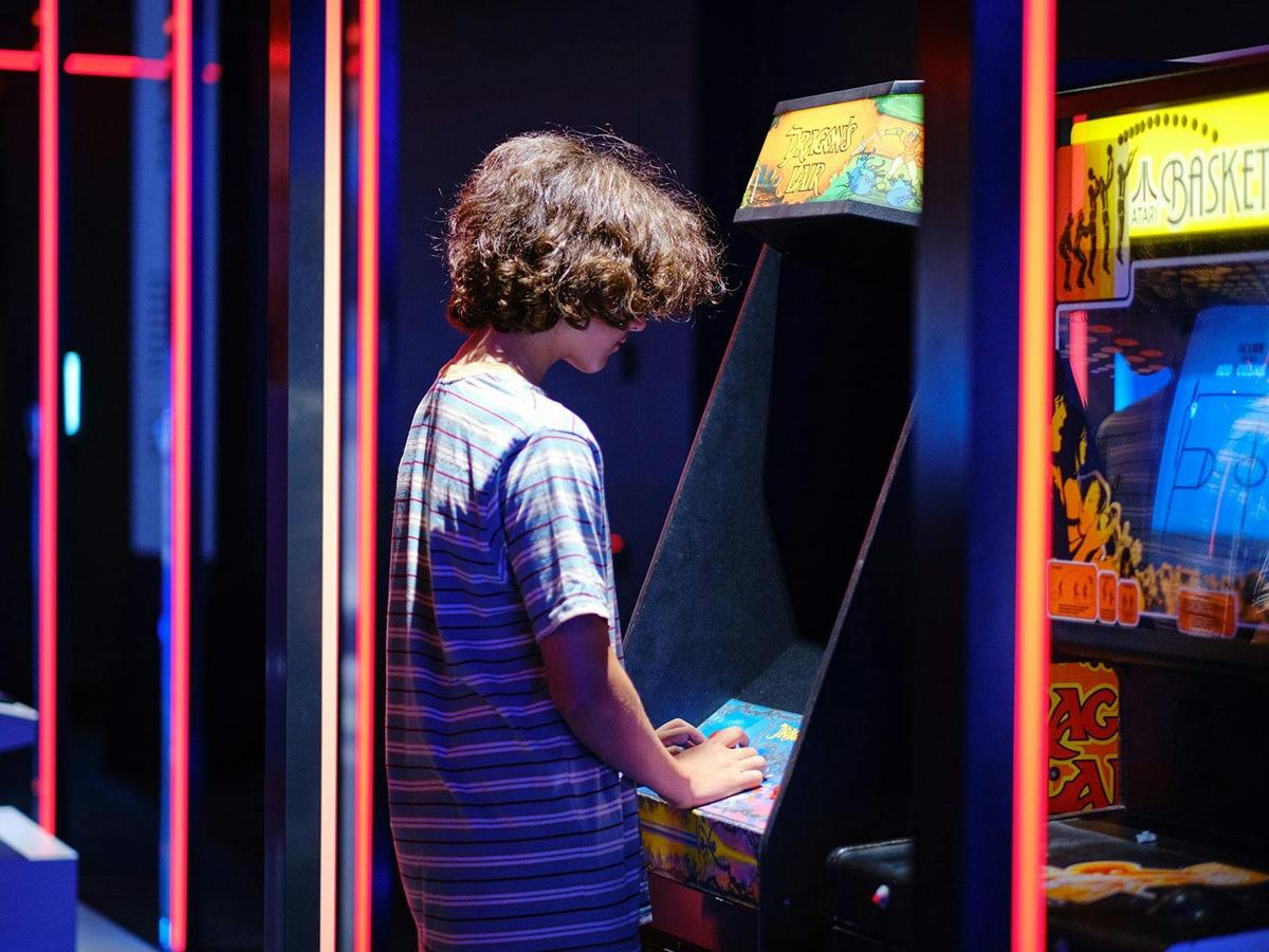 Boy playing in the Big Ant Studios Games Lab