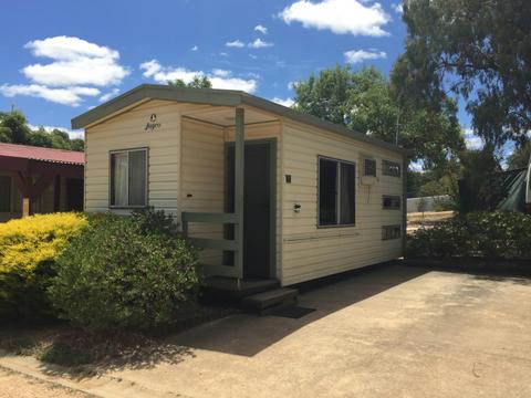 standard cabin double bed and a tripple bunk