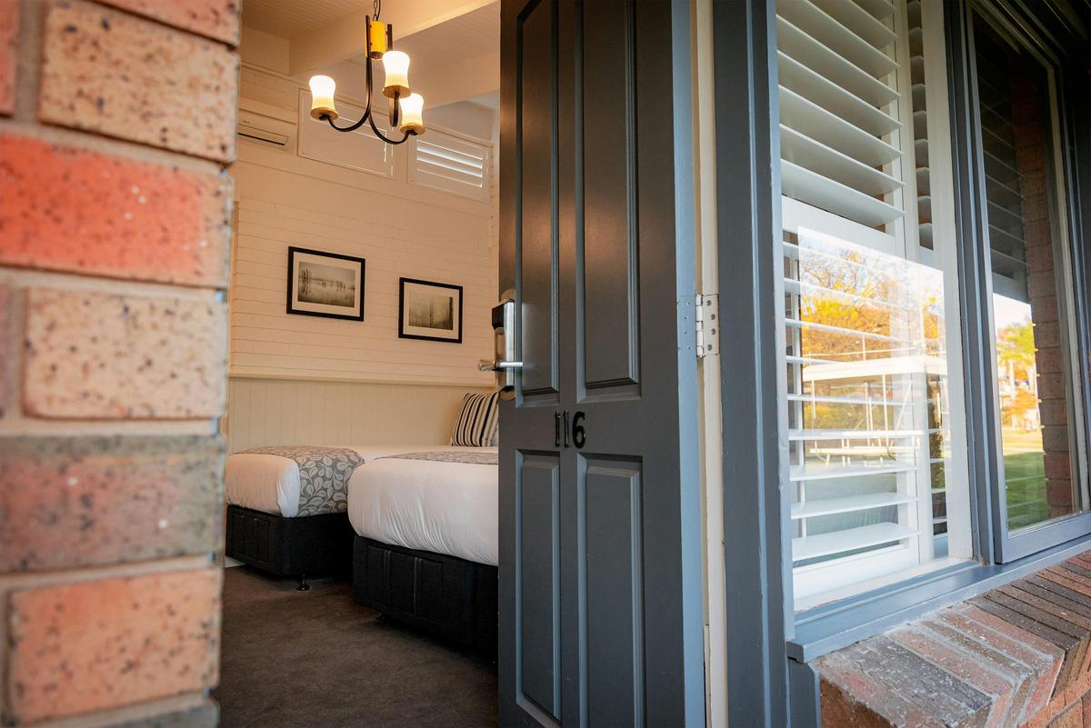 Open door revealing studio apartment at Alzburg Resort