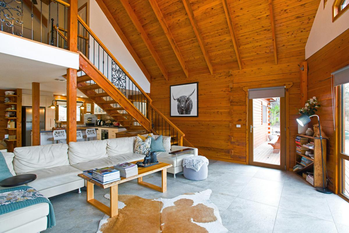 Soaring ceilings and cozy comfort at the heart of the retreat.