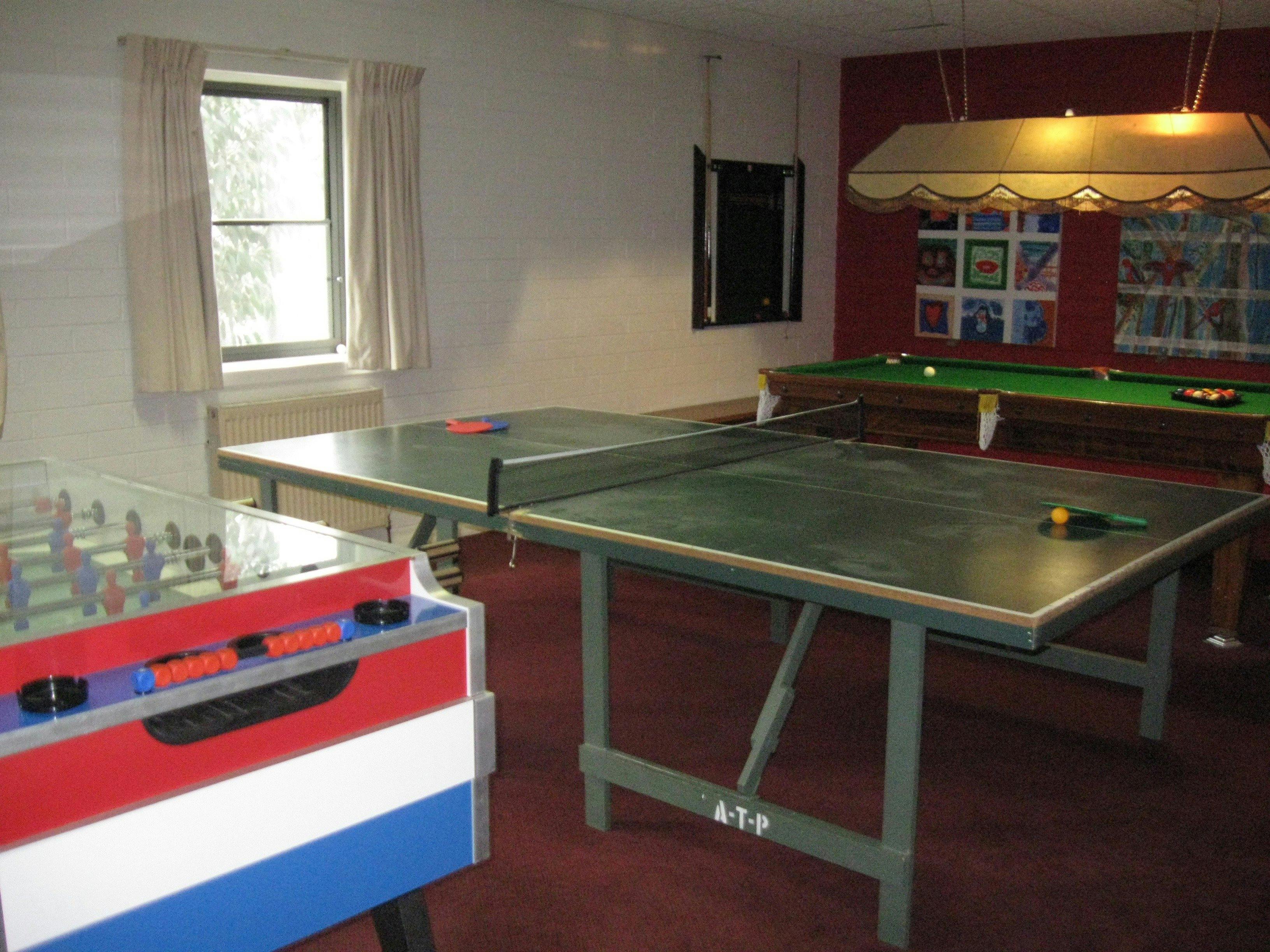 Pool table, foozball and table tennis