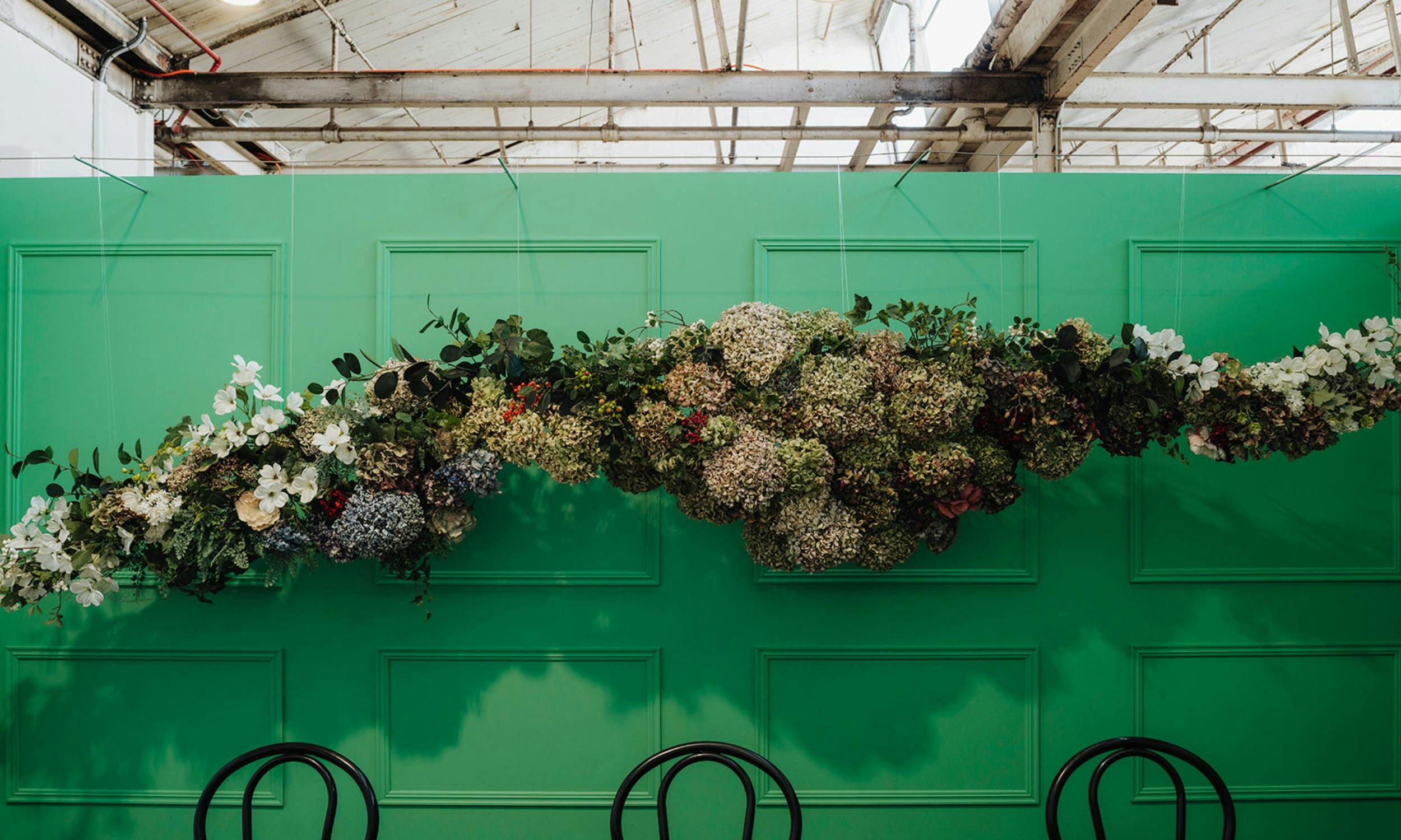 Floral installation decorating the Aysha Hansen workshop space.
