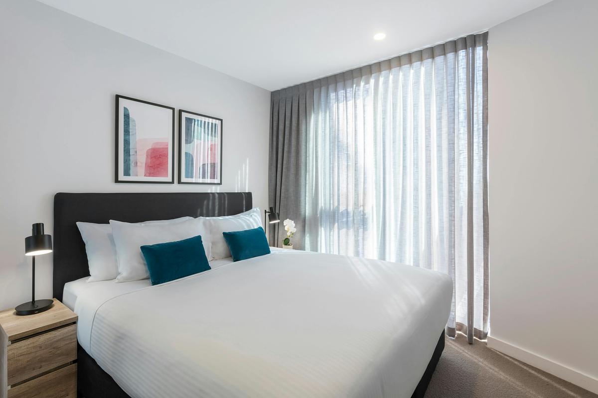 Avani Melbourne Central Residences-1 Bedroom Superior Suite-Bedroom-Curtains-HR