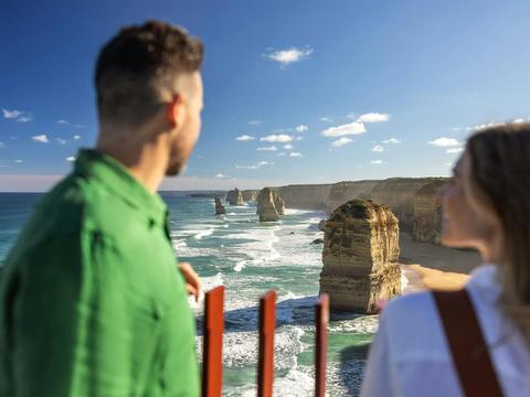 A couple look out over the 12 apostles