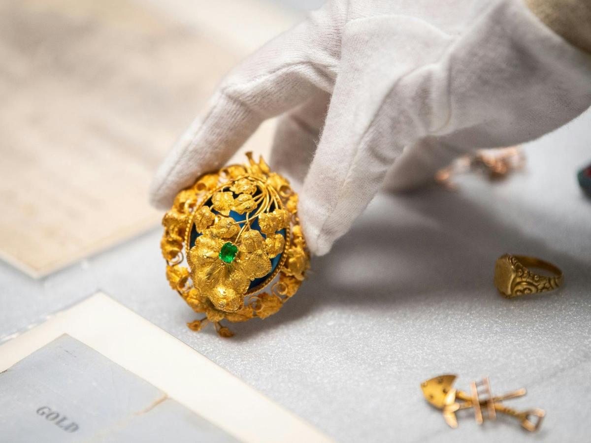 Close up of 19th century gold brooches