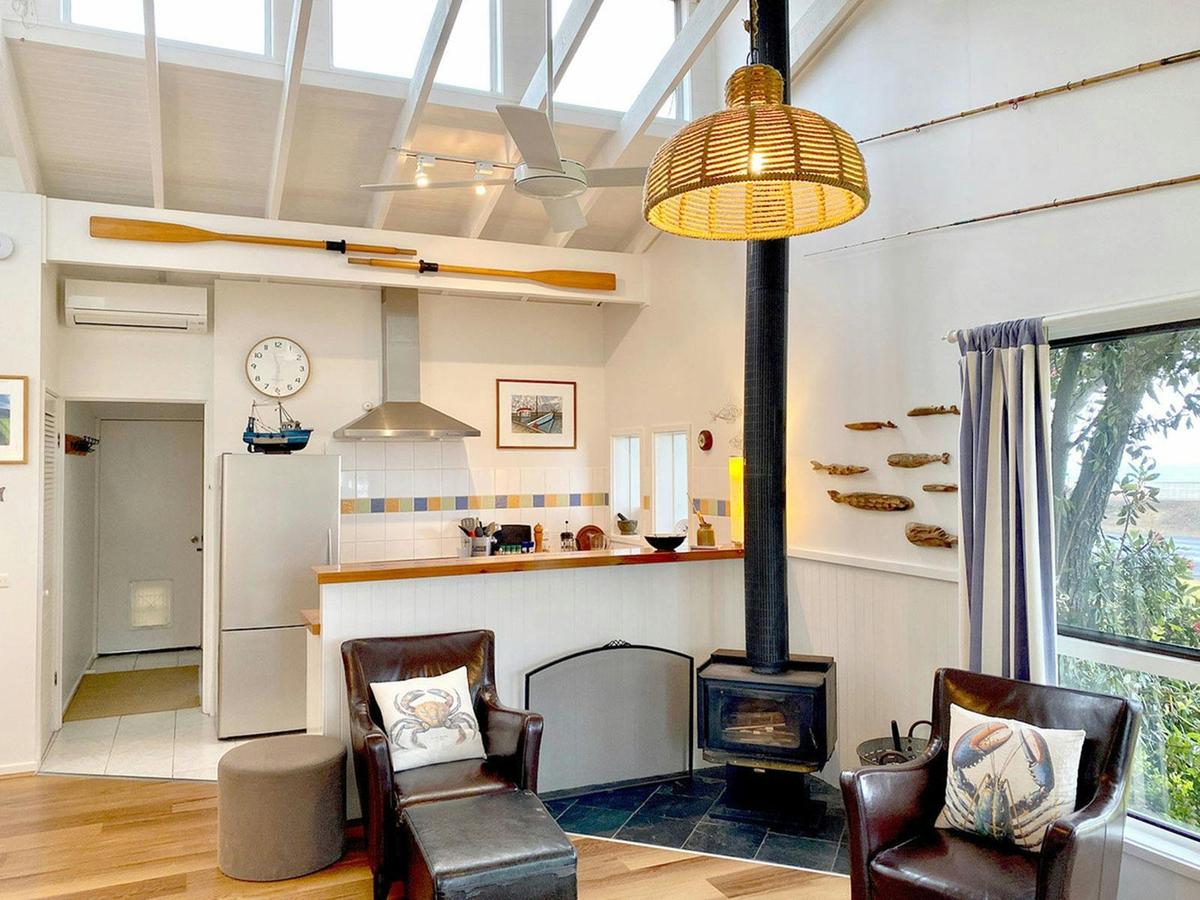 The open plan area includes the lounge, the kitchen and the dining space.  And the ocean view ...