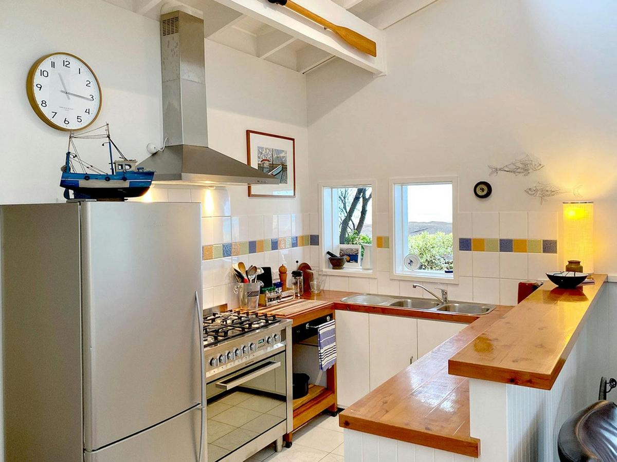 Beach Break's kitchen is fabulous and the perfect place to cook up a storm!