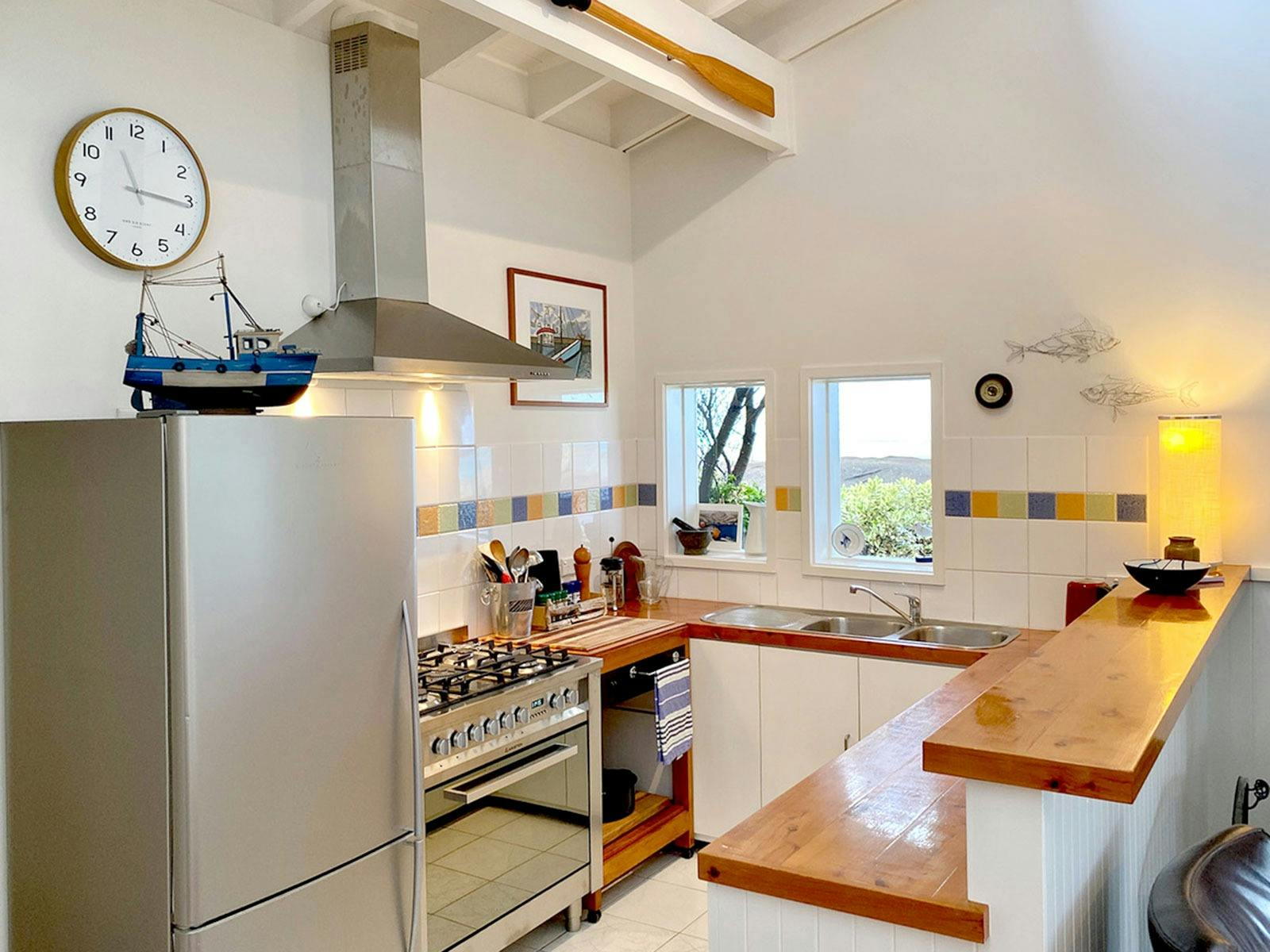 Beach Break's kitchen is fabulous and the perfect place to cook up a storm!