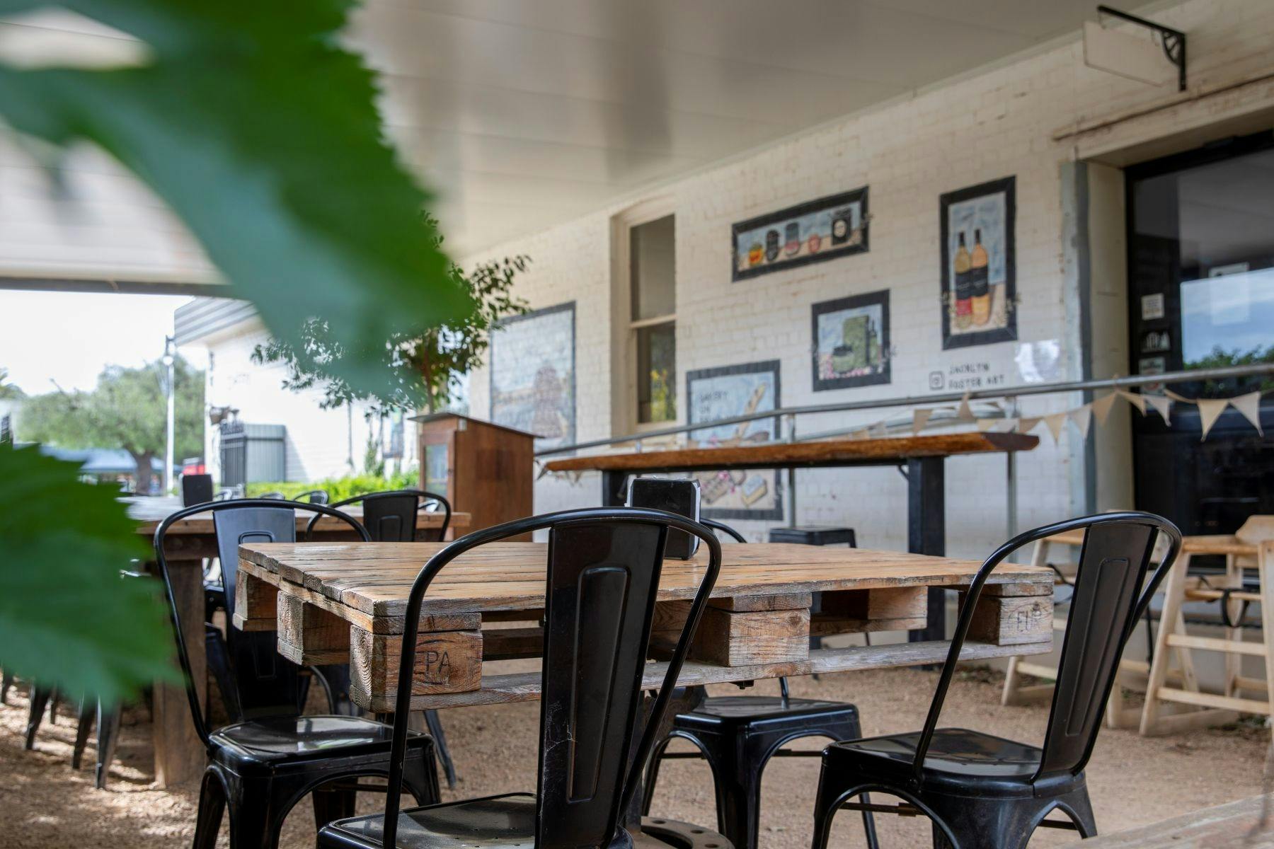 Outdoor tables and chairs undercover