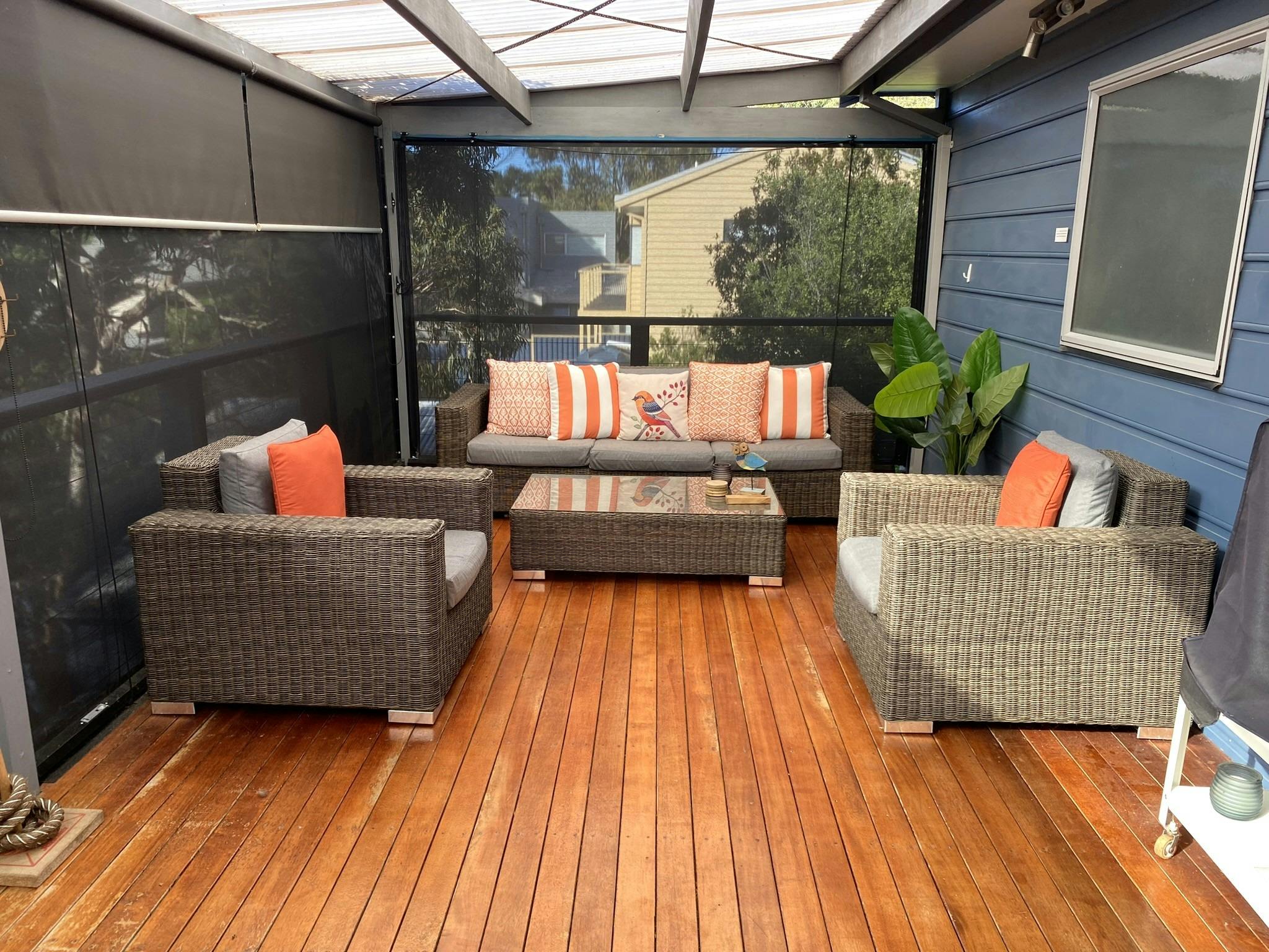 Deck seating with patio blinds