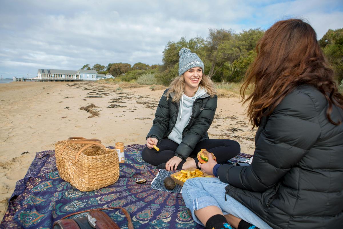 A beach picnic in the cooler months on the shores of the Barwon River
