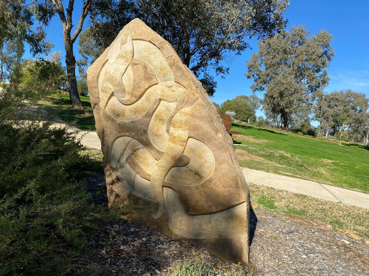 Snake on reverse of sculpture