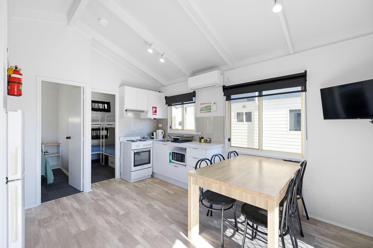 2 Bedroom Deluxe Villa Interior dining table and kitchenette