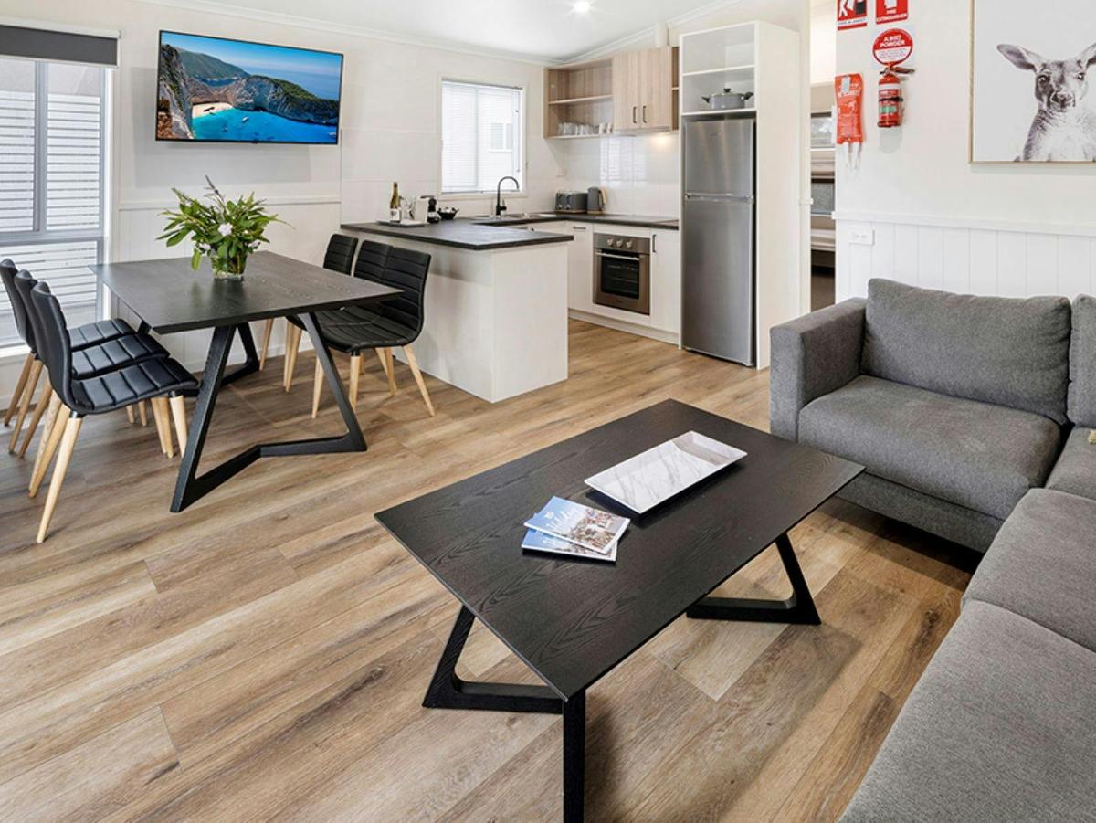 2 Bedroom Premium Villa Interior Living room, dining area and kitchenette