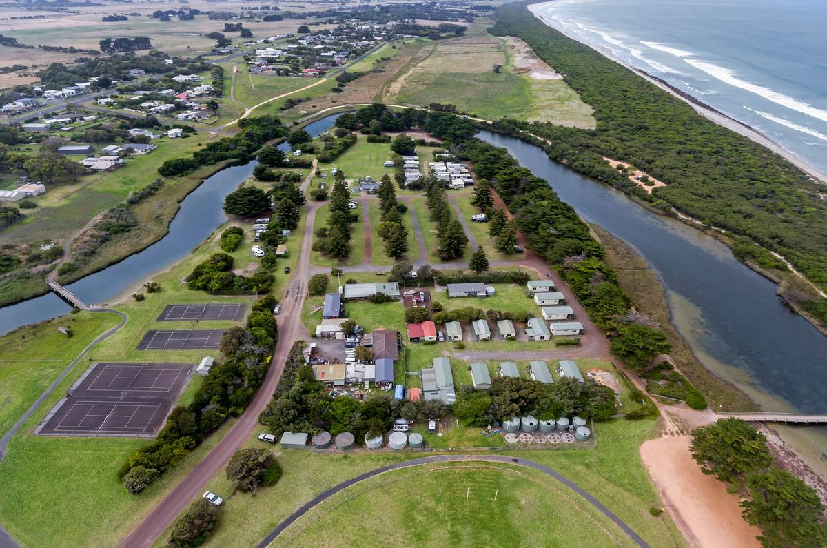 Aerial Shot of BIG4 Narrawong Island Holiday Park, Surrounded by Surry River and Beach