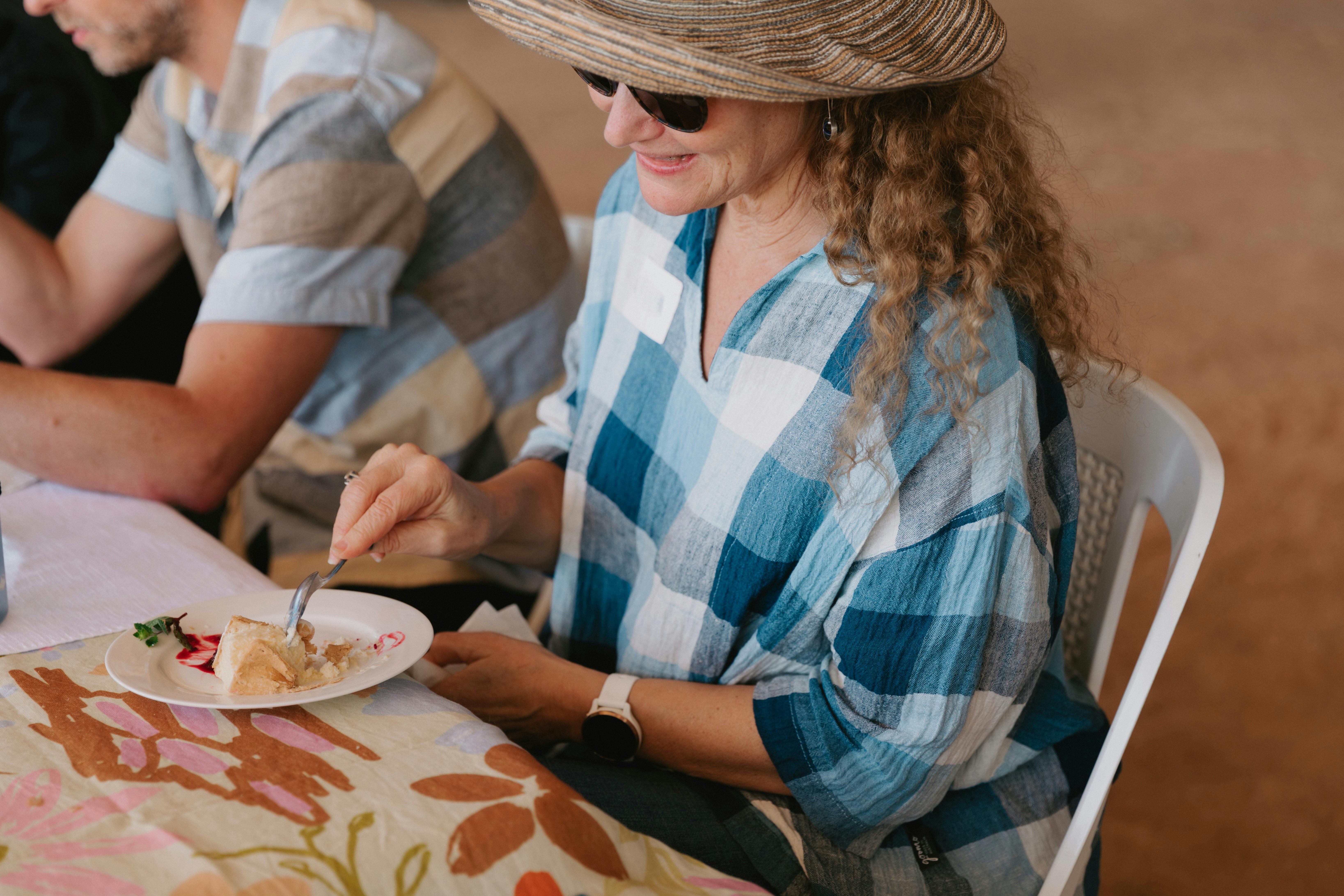 Enjoying a famous vanilla slice by Sharp's Bakery