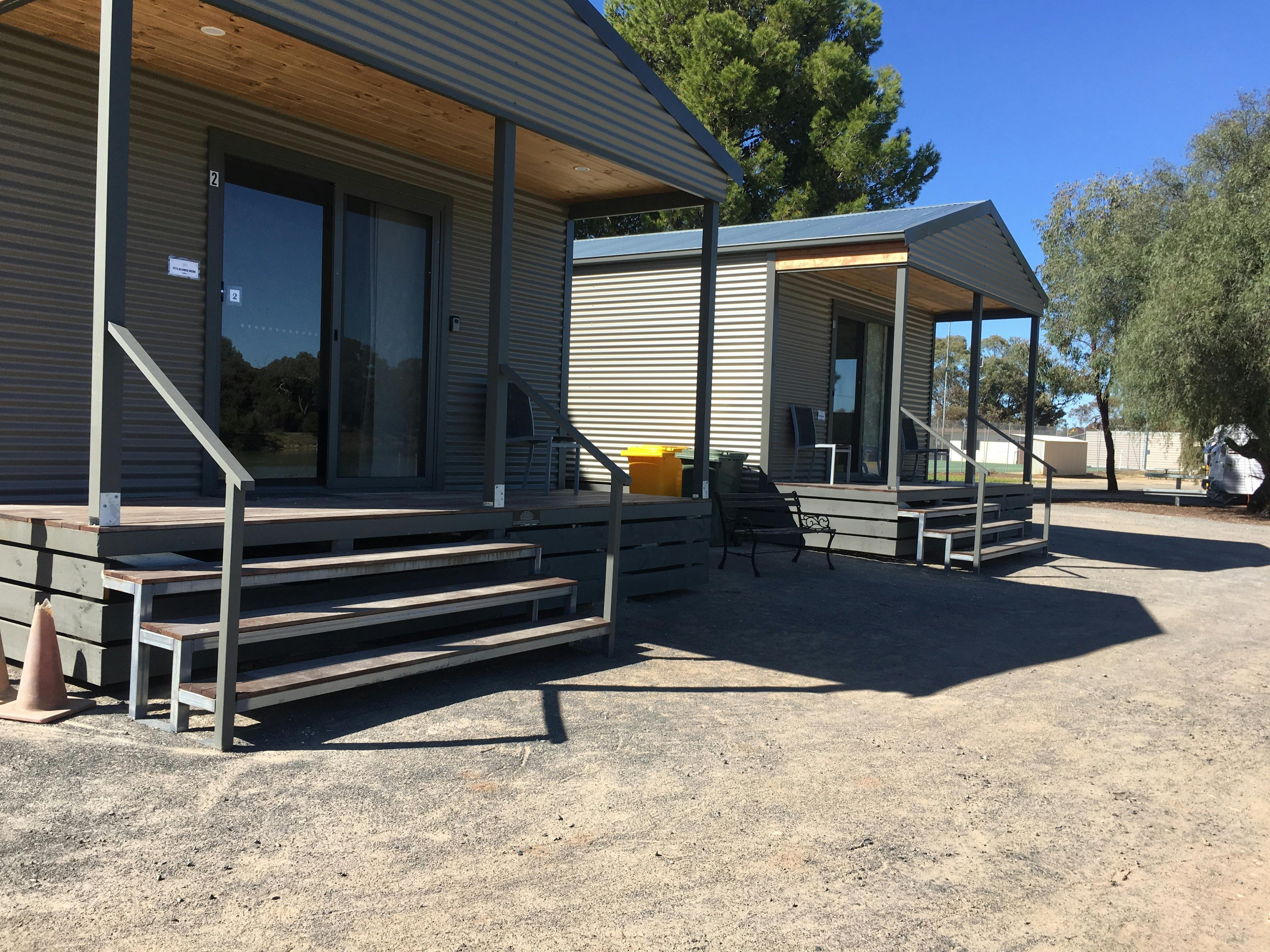 The two cabins in the caravan park