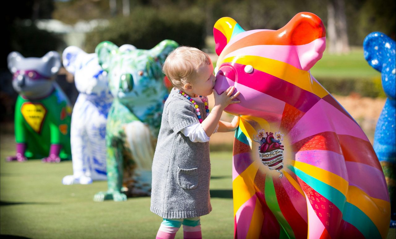 Hello Koalas sculpture Radiant Heart enjoys kisses from Jemma in  Port Macquarie