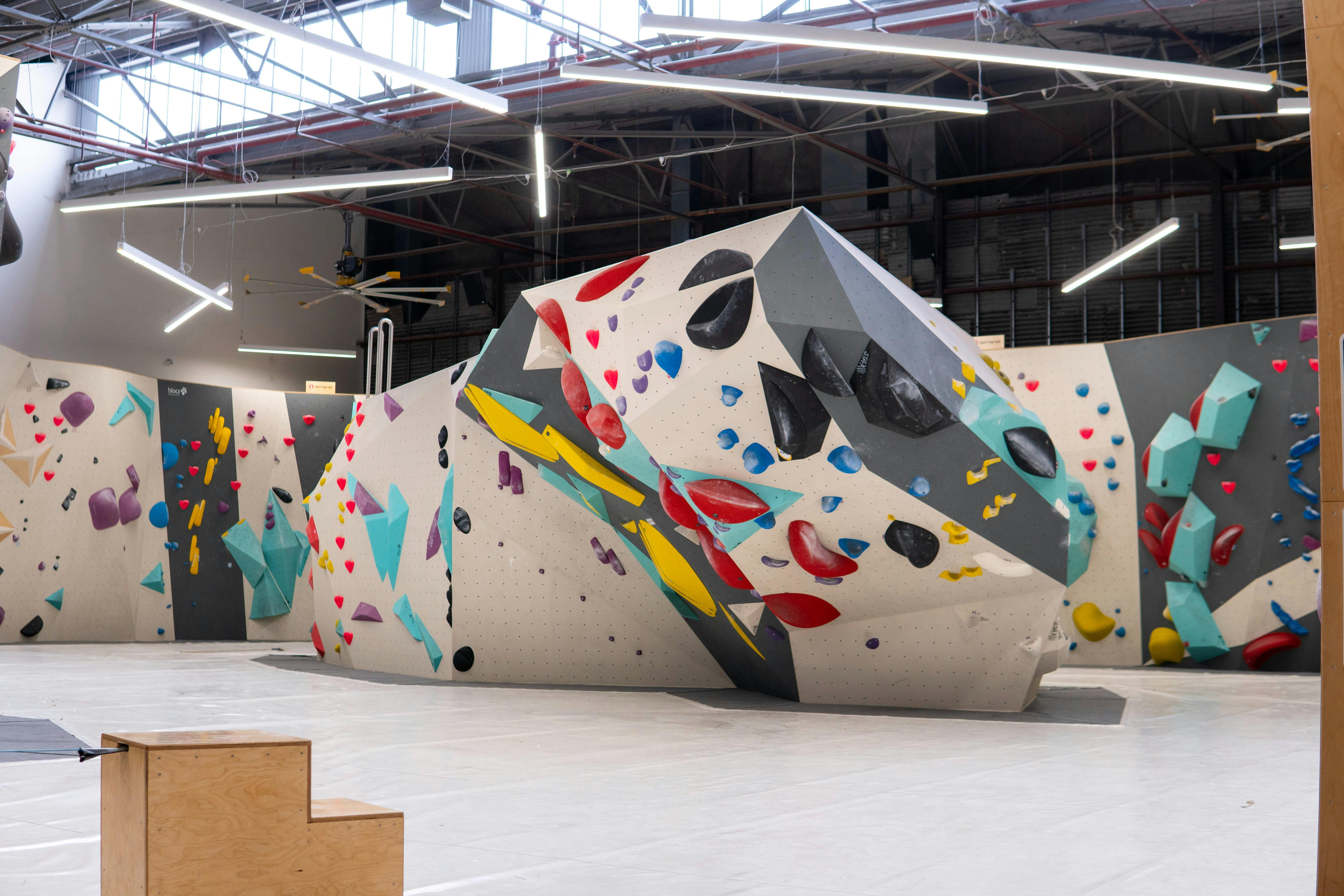 Picture of main climbing area featuring the Joker boulder.
