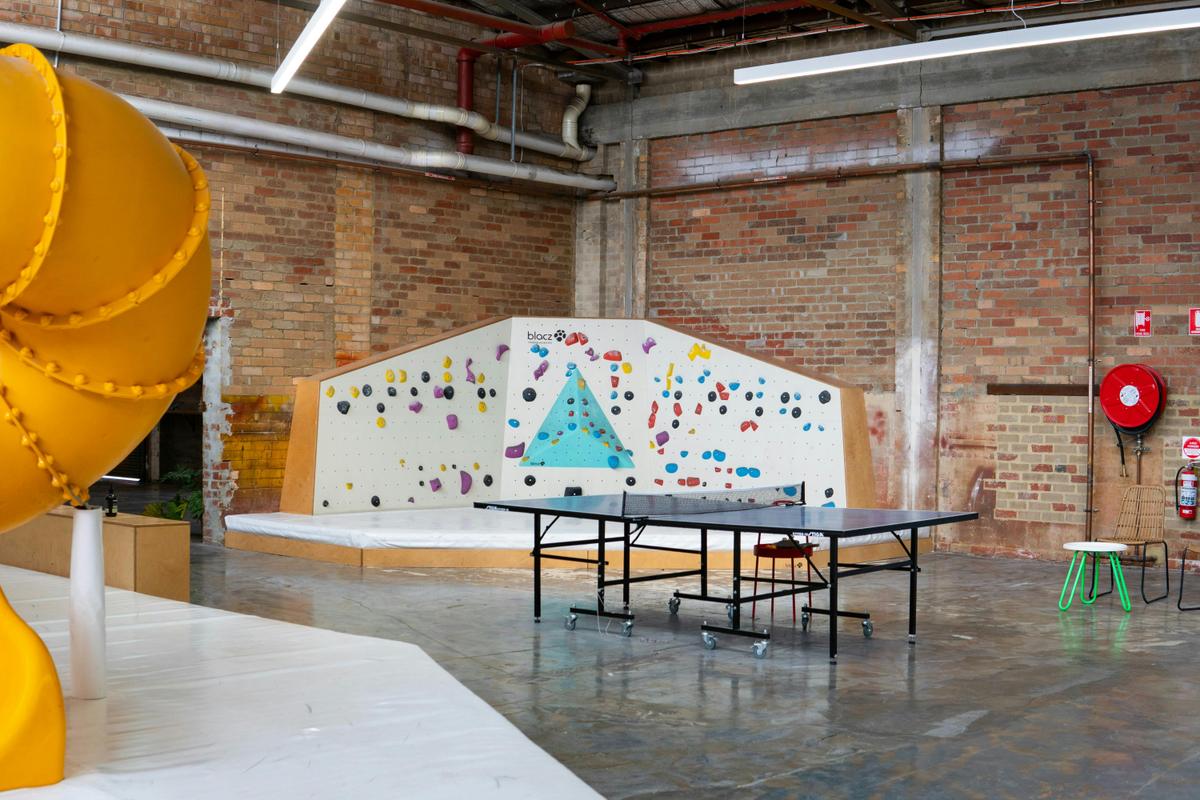 Picture of Family Haus climbing area featuring kids wall & table tennis.
