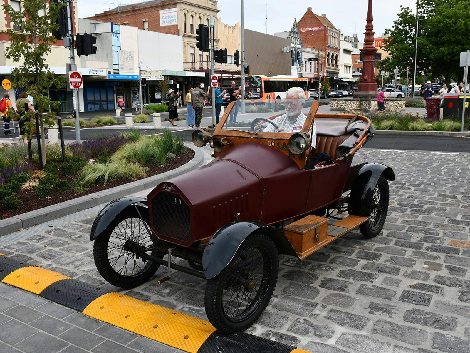 The first car to drive in the newly opened precinct