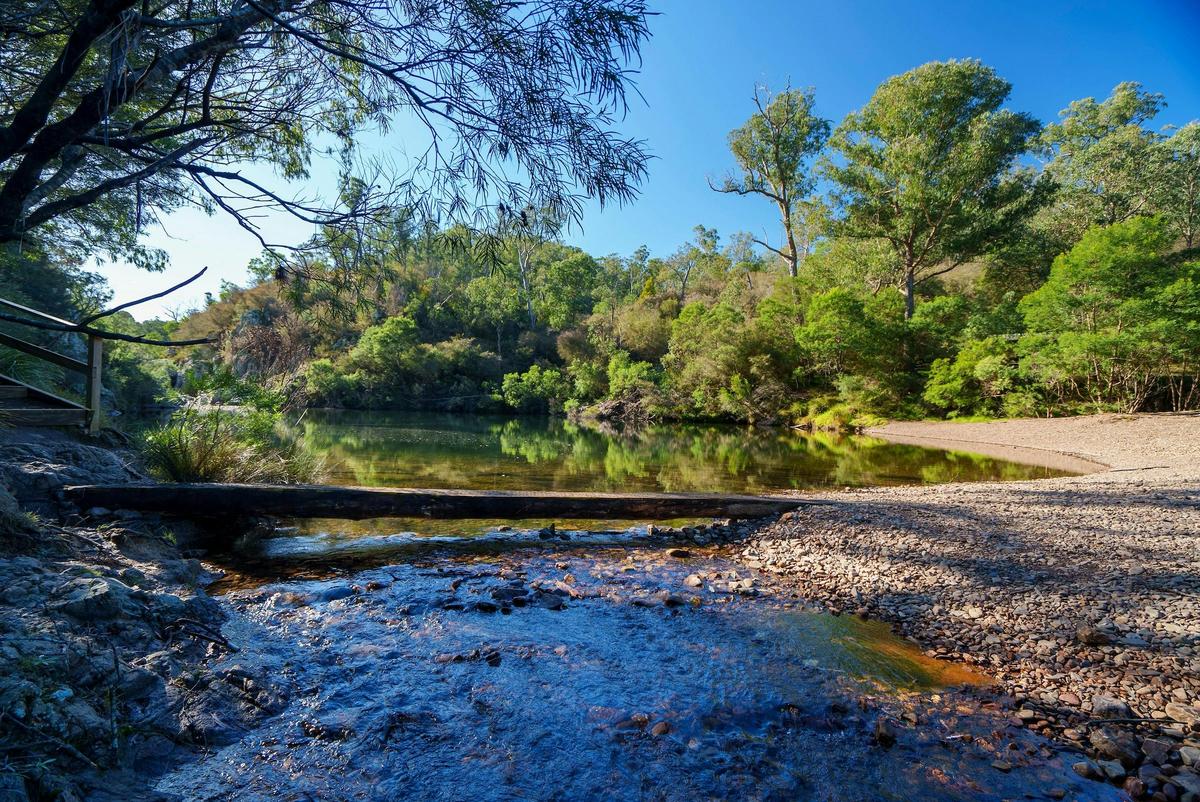 Blue Pool waterhole with beach area