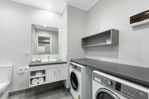 Bathroom with laundry facilities