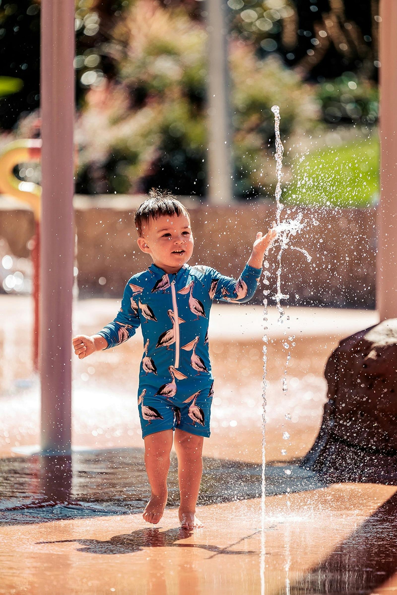 a lone boy at the Benalla Splash Park