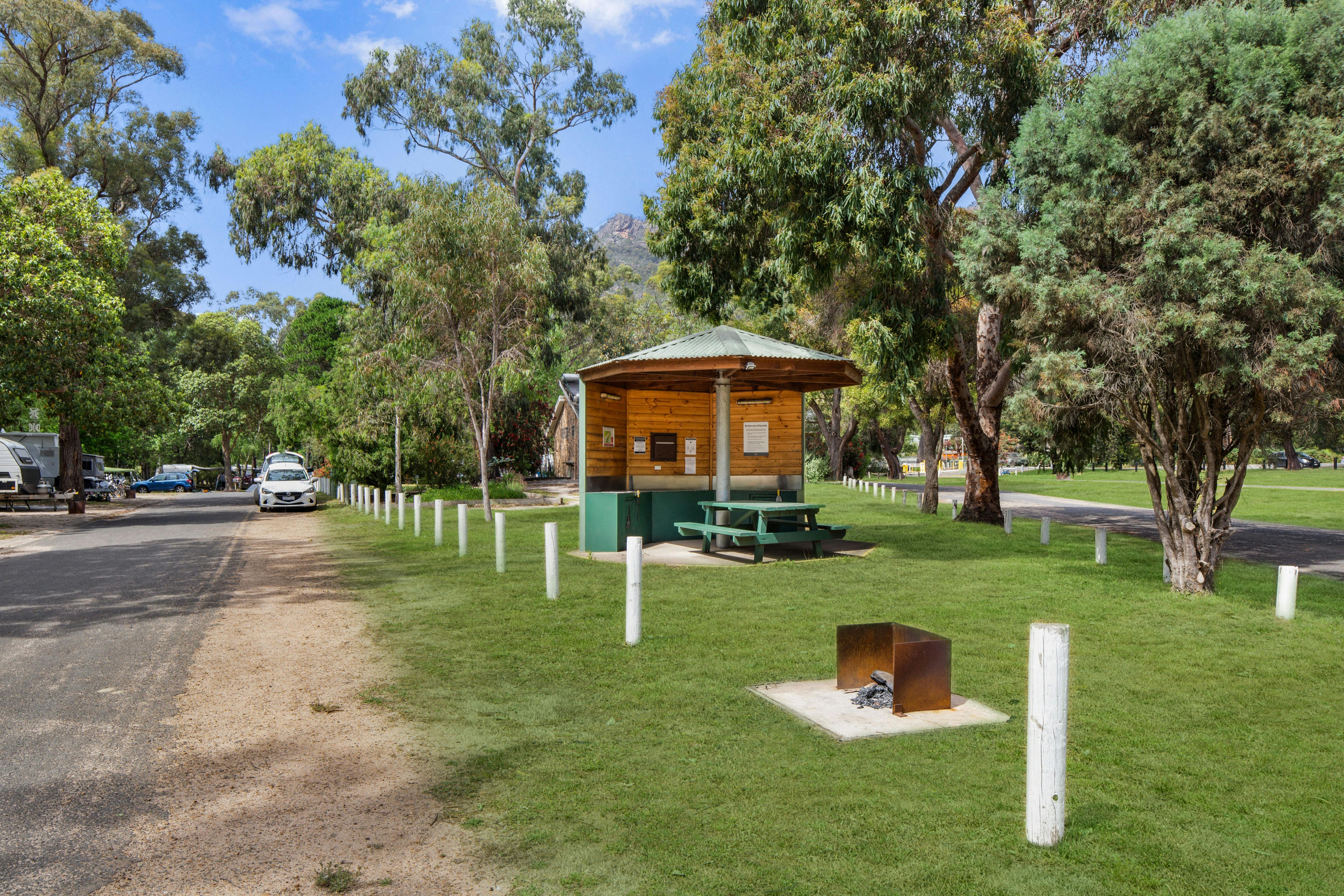 Communal fire pit and barbeque